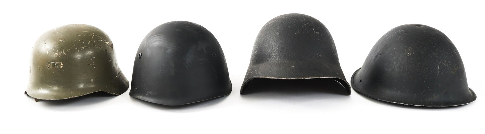 WWII - COLD WAR WORLD MILITARY HELMET LOT OF 4: WWII - COLD WAR WORLD MILITARY HELMET LOT OF 4 Lot of 4 WWII - Cold War World Military Helmets. (1) Swiss M18/43. (1) Spanish M42. (1) British MK IV. (1) Italian M33.