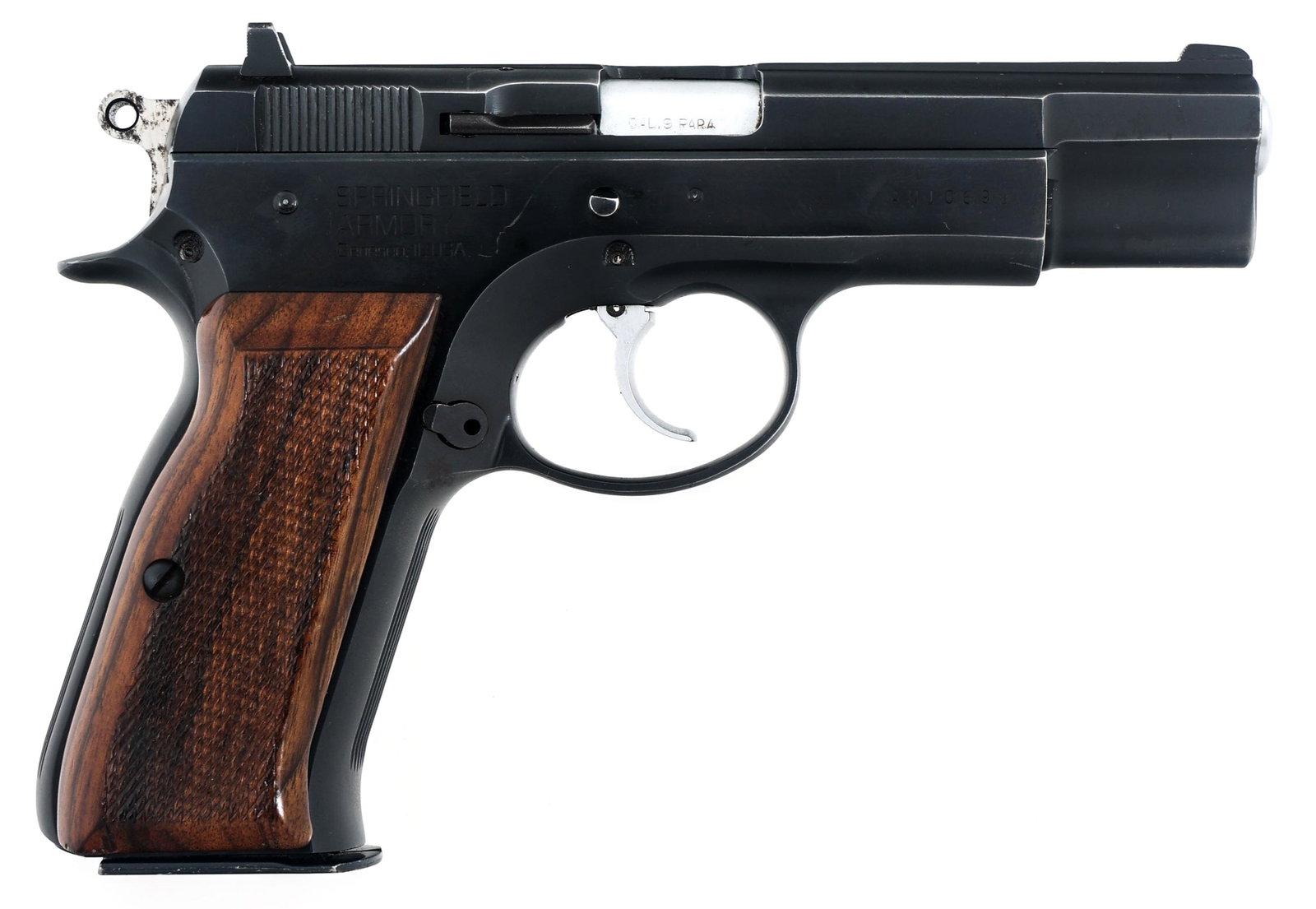 SPRINGFIELD ARMORY INC MODEL P9 9MM CALIBER PISTOL: SPRINGFIELD ARMORY INC MODEL P9 9MM CALIBER PISTOL Springfield Armory Inc Model P9 9x19mm caliber semi automatic pistol. Fixed iron sights. Blue finish. Checkered hardwood grips. One magazine. Caliber