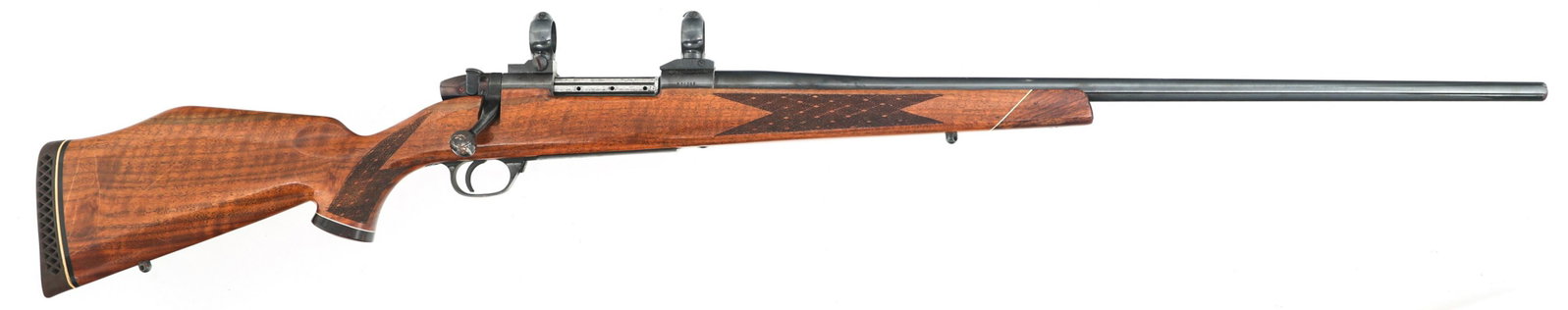 WEATHERBY MARK V .270 MAGNUM CALIBER FIFLE: WEATHERBY MARK V .270 MAGNUM CALIBER FIFLE Weatherby Mark V .270 Magnum caliber bolt action rifle. Blued finish. Checkered Walnut stock. Scope rings. Swivel studs. Rubber recoil pad. Caliber / Gauge: 