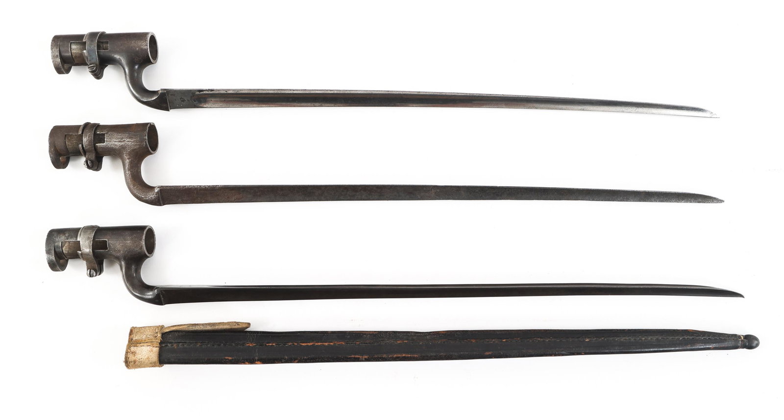 BRITISH M1853 & M1876 SOCKET BAYONET LOT OF 3: BRITISH M1853 & M1876 SOCKET BAYONET LOT OF 3 Lot of 3 British Pattern M1853 and M1876 Socket Bayonets. (1) M1853 Pattern Enfield Socket Bayonet. Triangular blue blade. Marked "3" and "W&S" on the ric