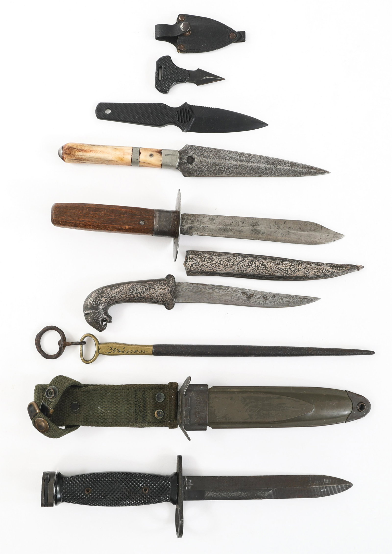 VIETNAM WAR M7 BAYONET AND FIXED BLADE LOT OF 7: VIETNAM WAR M7 BAYONET AND FIXED BLADE LOT OF 7 Lot of 7 Fixed Blades & M7 Bayonet. (1) M7 Bayonet. Partial double sided, straight blade. Steel hilt. Maker marked "US M7 BOC" on the crossguard. Compos