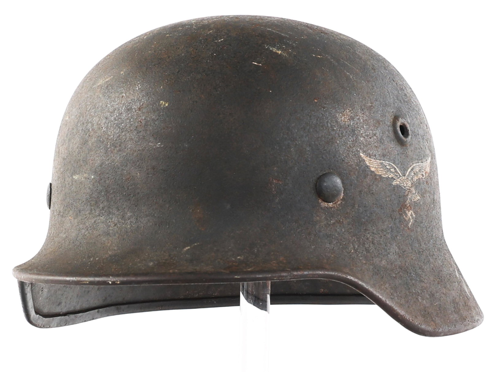 WWII GERMAN LUFTWAFFE M40 SD COMBAT HELMET: WWII GERMAN LUFTWAFFE M40 SD COMBAT HELMET WWII German Luftwaffe M40 Single Decal Combat Helmet. Stamped "I027" inside shell near the rim. Stamp over left ear is faded, with complete liner.
