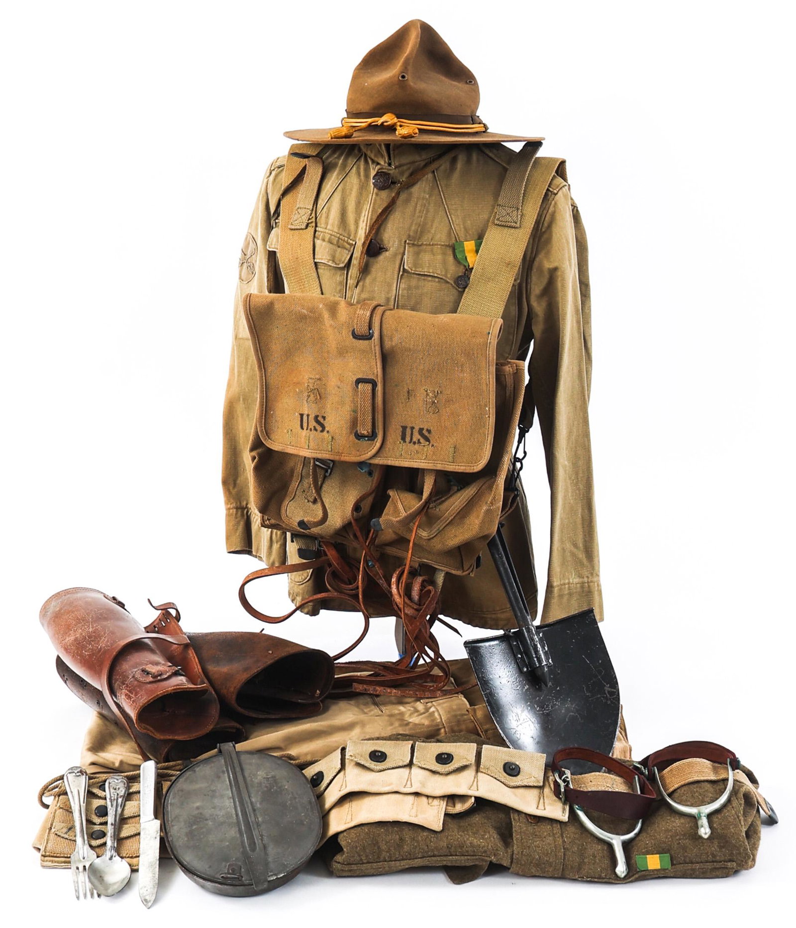 PRE - WWI US CAVALRY UNIFORM & FIELD GEAR LOT: PRE - WWI US CAVALRY UNIFORM & FIELD GEAR LOT Lot of Assorted Pre - WWII US Cavalry Uniform and Field Gear. (1) M1912 Khaki Cotton Service Tunic with US Cavalry collar disks with "C" insignia, Mexican