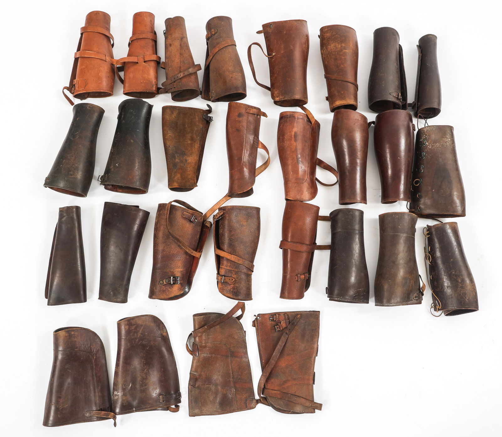 WWI US ARMY CALVARY OFFICER LEATHER GAITERS LOT: WWI US ARMY CALVARY OFFICER LEATHER GAITERS LOT Lot of 14 Pairs of WWI US Army Calvary Officer Leather Gaiters. Various styles and manufacturers.