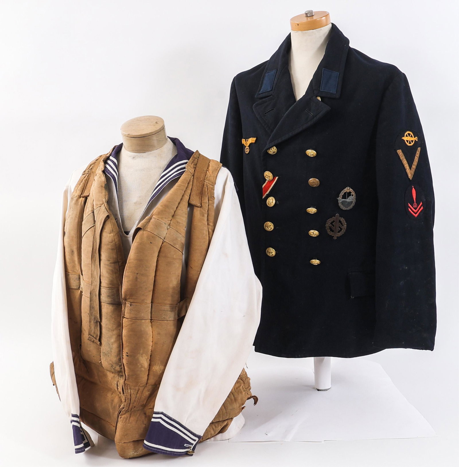WWII GERMAN KRIEGSMARINE UNIFORM LOT OF 3: WWII GERMAN KRIEGSMARINE UNIFORM LOT OF 3 Lot of 3 WWII German Kriegsmarine Uniform Items. (1) Kriegsmarine Pea Coat. Torpedo engineer second class trade / rank shoulder patch. Torpedo control foreman