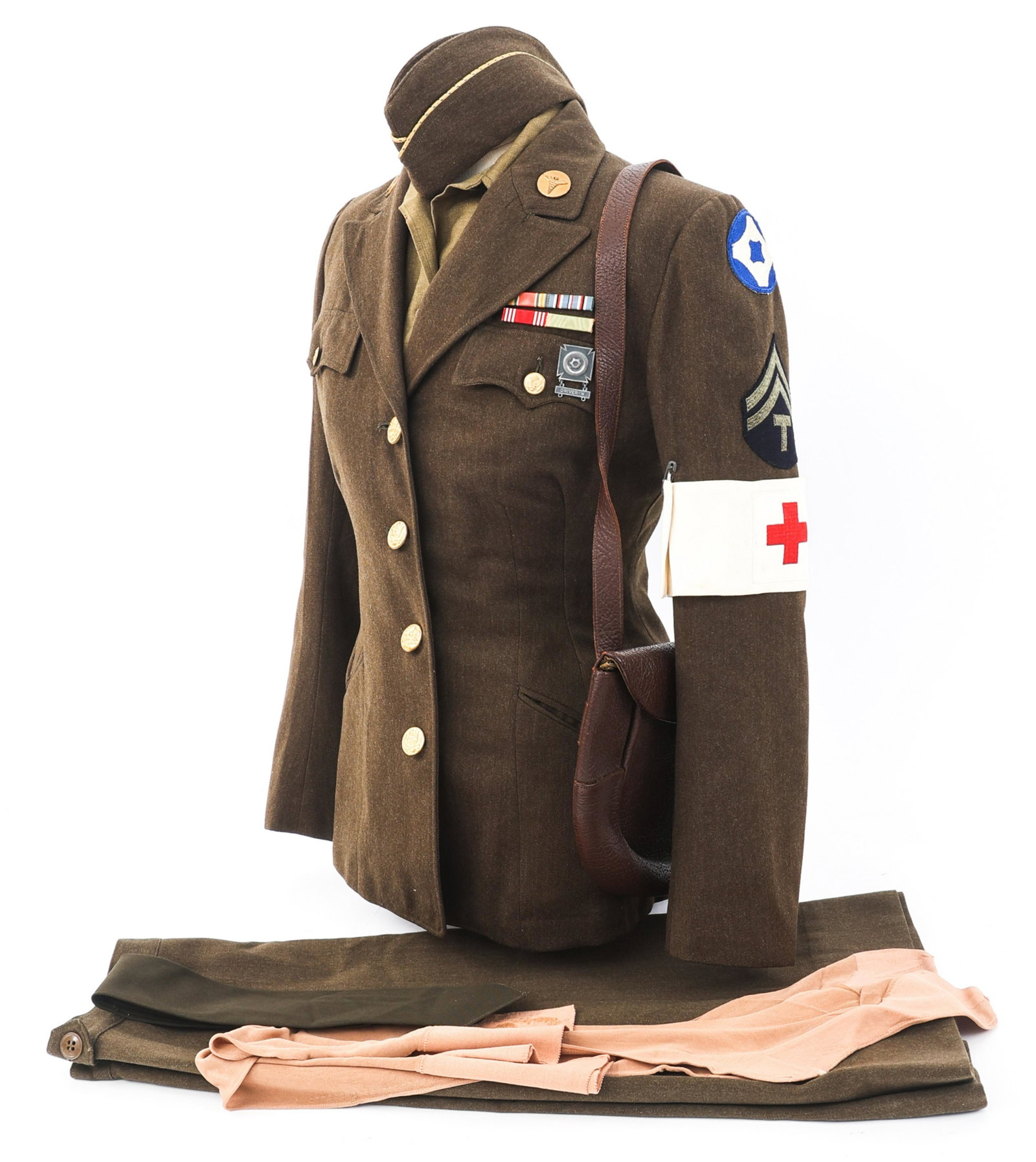 WWII US ARMY ENLISTED MEDICAL DRIVER WAC UNIFORM: WWII US ARMY ENLISTED MEDICAL DRIVER WAC UNIFORM WWII US Army WAC Enlisted Medical Driver Complete Uniform Set. Named to 5th Grade Technician Madeline M. Sparano, A-216793. OD tunic with "US" and Medi
