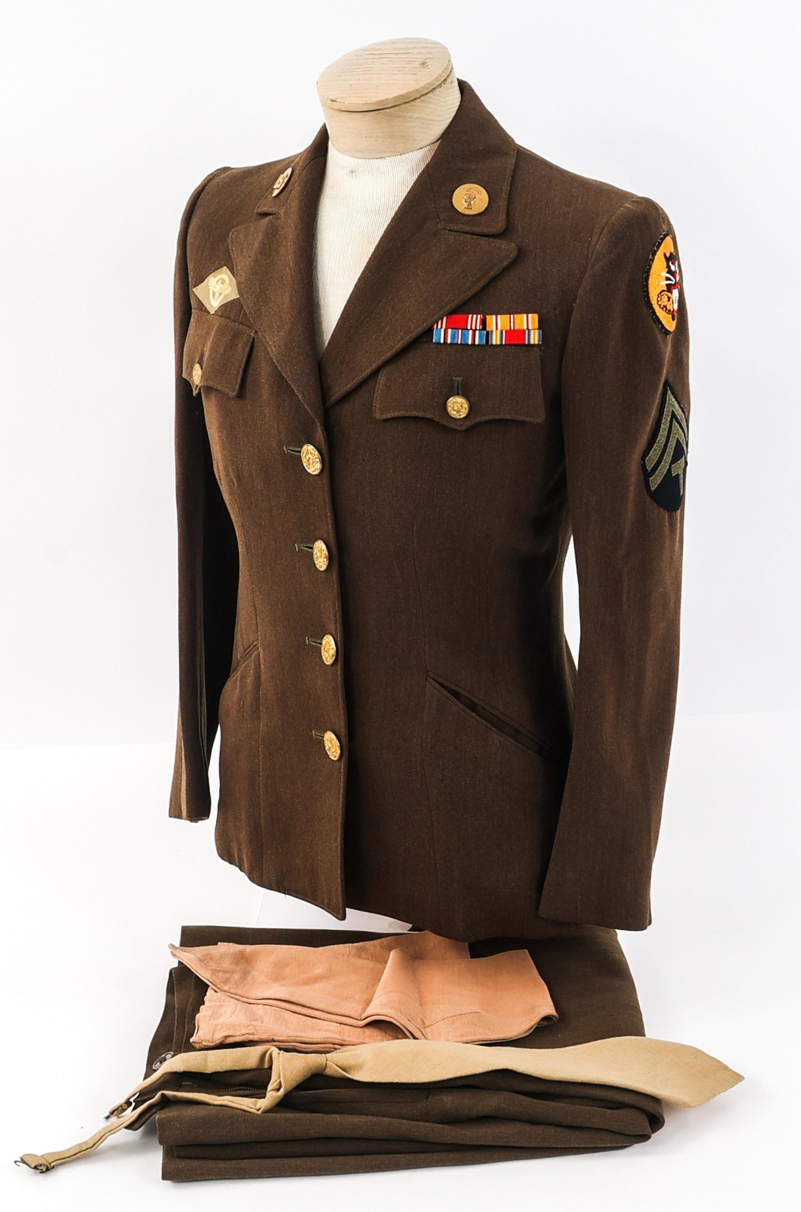 WWII US ARMY TANK DESTROYER WAC NAMED UNIFORM: WWII US ARMY TANK DESTROYER WAC NAMED UNIFORM WWII US Army WAC Tank Destroyer Uniform. Named to Technician 4th Grade Norma Martin, A-610895. Dark OD tunic with Tank Destroyer shoulder patch, technicia
