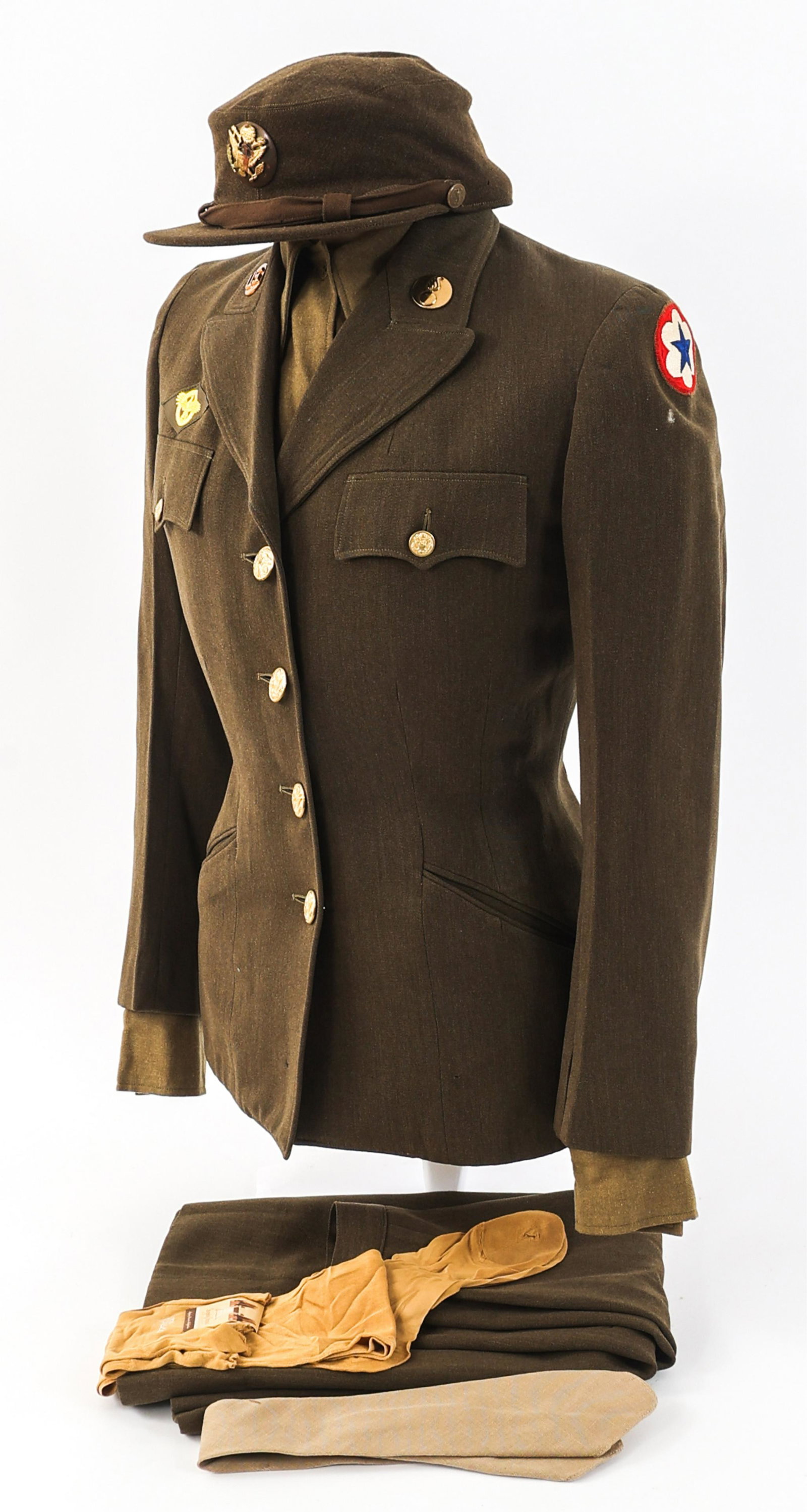 WWII US ARMY WAC SERVICE FORCES ENLISTED UNIFORM: WWII US ARMY WAC SERVICE FORCES ENLISTED UNIFORM WWII US Women's Army Corps (WAC) Army Service Forces Enlisted Uniform. Serge, fine wool tunic with Army Service Forces shoulder patch, ruptured duck br