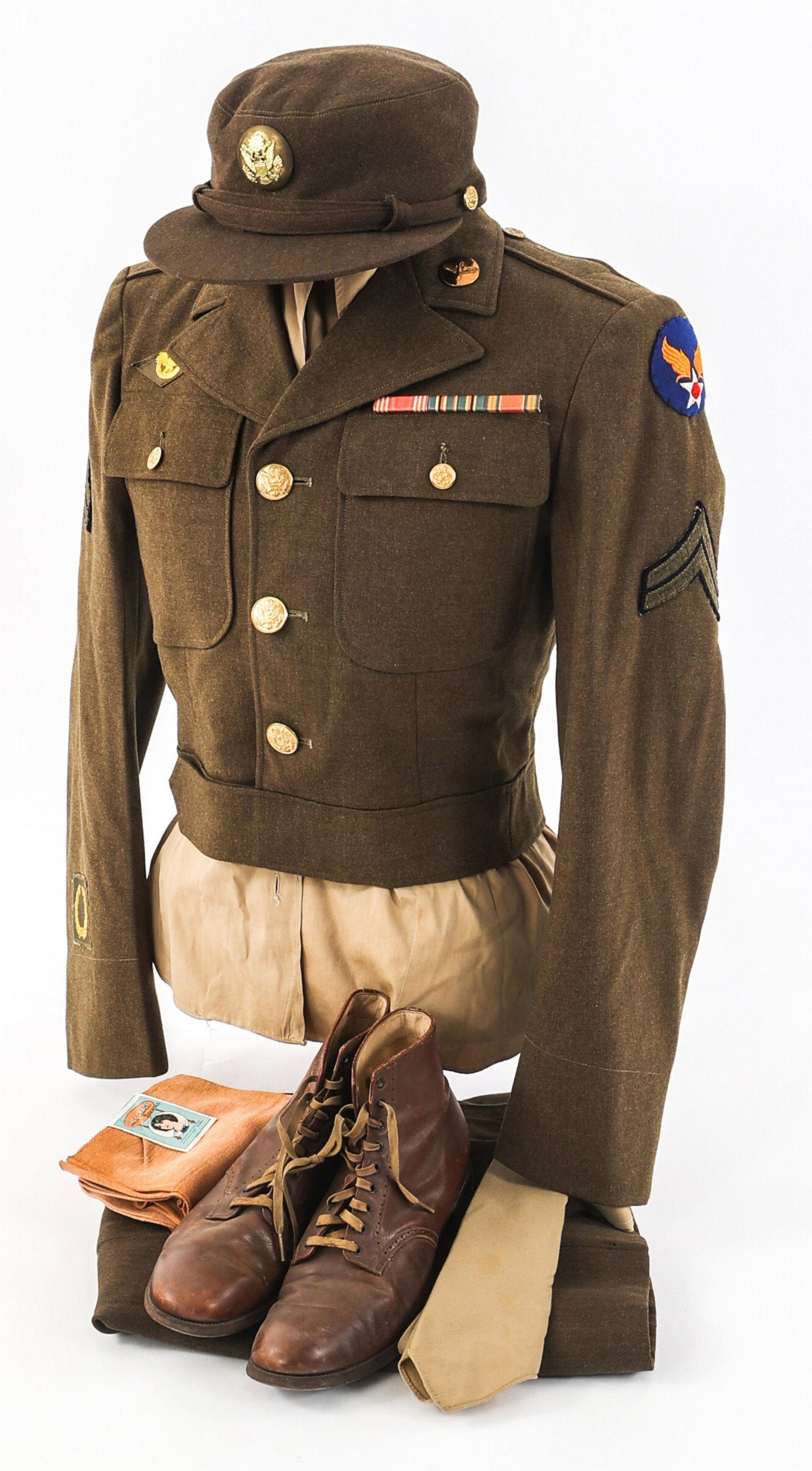 WWII USAAF WOMEN'S ARMY CORPS NCO UNIFORM SET: WWII USAAF WOMEN'S ARMY CORPS NCO UNIFORM SET WWII USAAF WAC NCO Uniform Set. Ike jacket with USAAF felt shoulder patch, corporal rank stripes, ribbon bar and insignia. Khaki shirt, brown skirt, tie, 