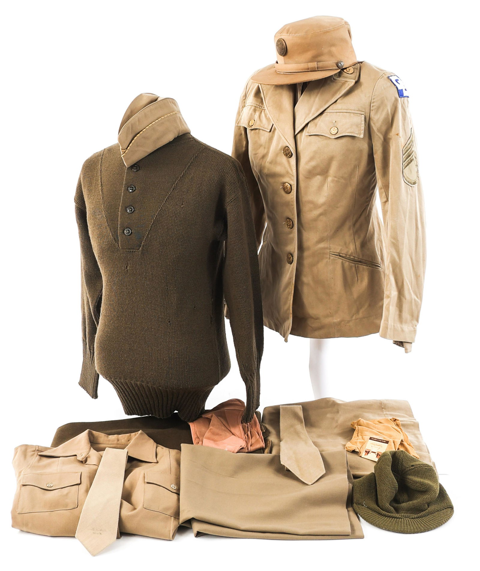 WWII US ARMY WAC WOMEN'S UNIFORM LOT: WWII US ARMY WAC WOMEN'S UNIFORM LOT Lot of WWII US Army WAC Women's Uniform Items. (1) Khaki cotton NCO summer service jacket with 2nd Service Command shoulder patch, WAC collar disks, and Staff Serg