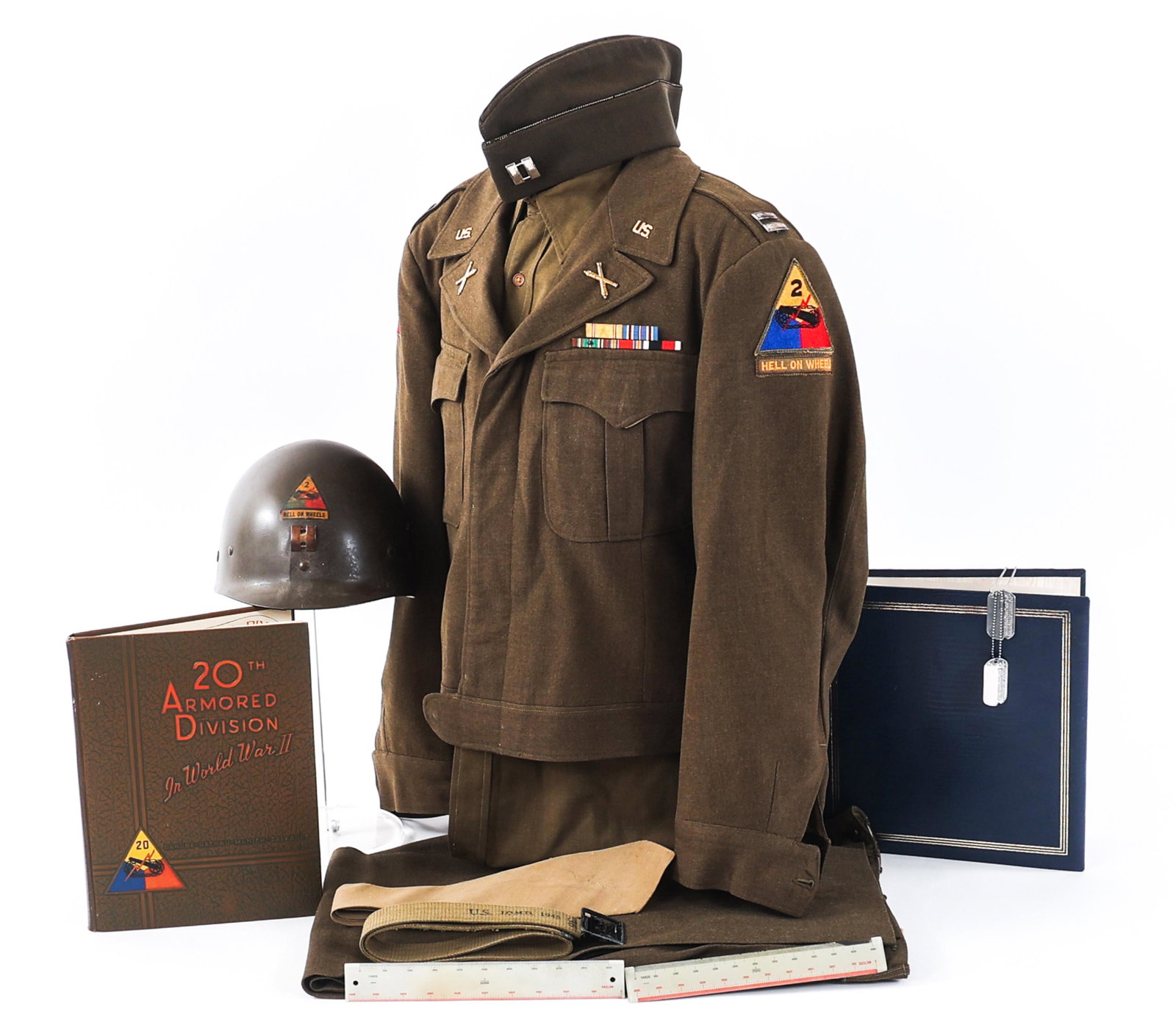 WWII US 20th / 2nd ARMORED DIV UNIFORM GROUPING: WWII US 20th / 2nd ARMORED DIV UNIFORM GROUPING WWII US Army 20th / 2nd Armored Divisions Uniform Grouping. Attributed to Captain Lester G. Delafield of the14th Armored Field Artillery Battalion. (1) 