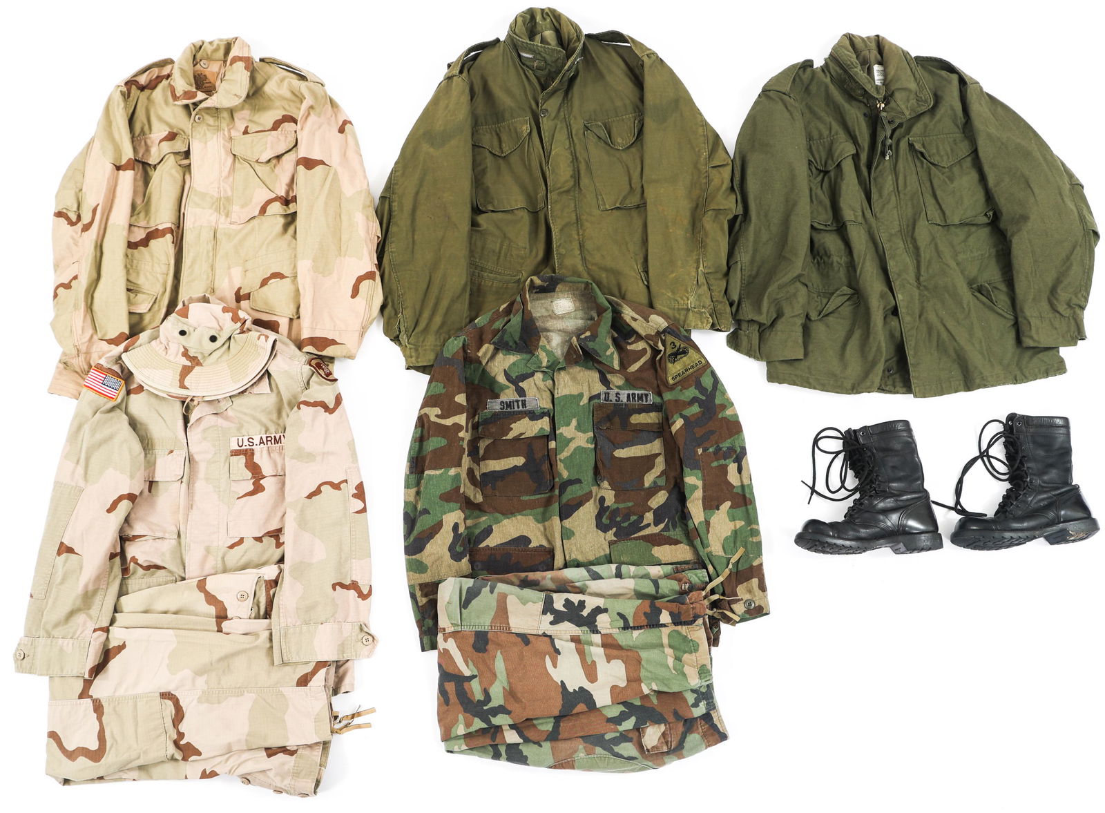 US ARMY CAMO UNIFORM / JACKET & COMBAT BOOTS LOT: US ARMY CAMO UNIFORM / JACKET & COMBAT BOOTS LOT Lot of 10 US Army Camo Uniforms, Jackets, and Combat Boots. (1) US Army Desert Camo Pattern Jacket. Linen material with 4 pockets. Iowa National Guard