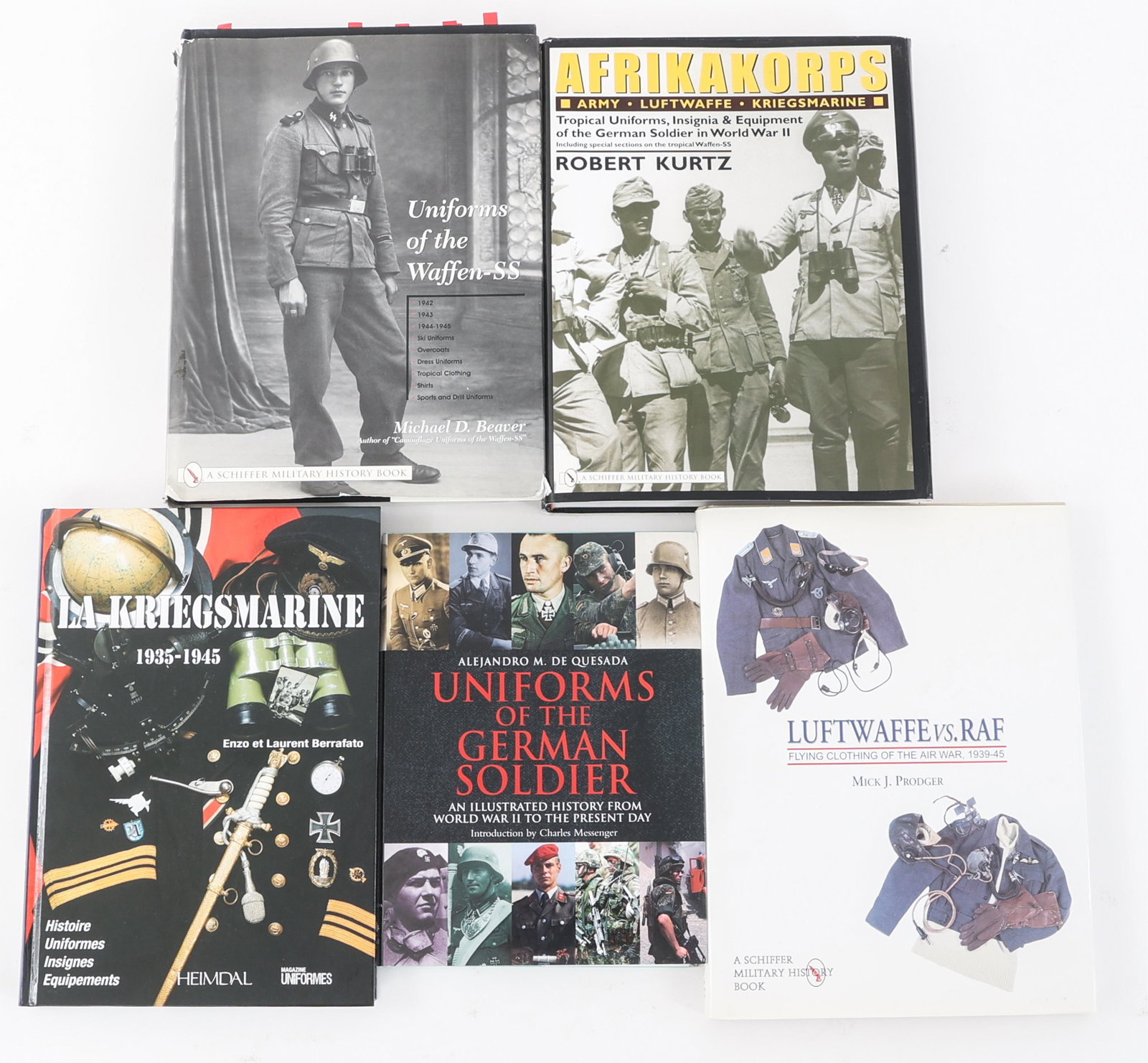 WWII GERMAN MILITARY UNIFORM REFERENCE BOOK LOT: WWII GERMAN MILITARY UNIFORM REFERENCE BOOK LOT Lot of 5 WWII German Wehrmacht Uniform Hardcover Reference Books. Four in English, one in French. Size: 10 1/2" x 7 3/4" - 12 1/4" x 9 1/2"