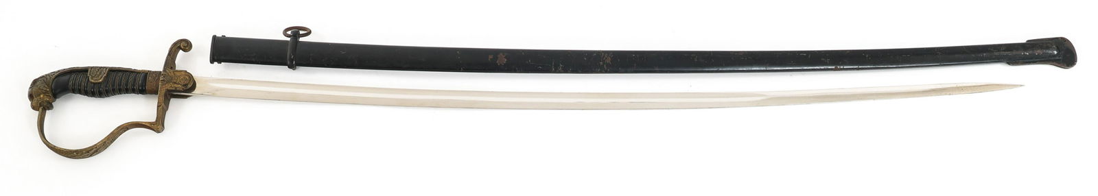 WWII GERMAN ARMY OFFICER LIONHEAD SWORD: WWII GERMAN ARMY OFFICER LIONHEAD SWORD WWII German Army Officer Lion Head Sword. Single edged, curved, bright blade with fuller. No maker mark visible. Leather buffer pad present. Decorated brass hil