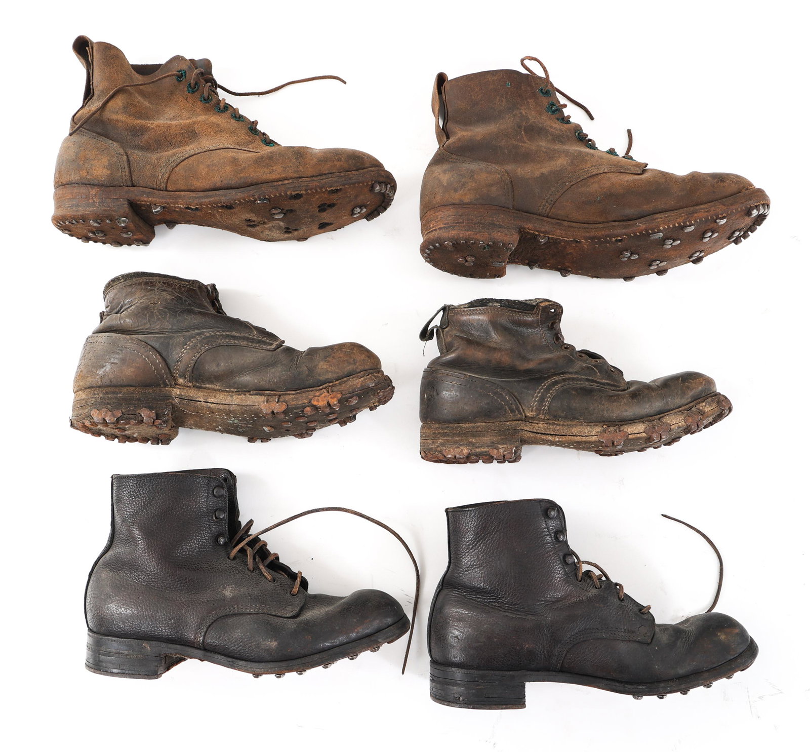 WWII GERMAN WEHRMACHT COMBAT & MOUNTAIN BOOT LOT: WWII GERMAN WEHRMACHT COMBAT & MOUNTAIN BOOT LOT Lot of 3 WWII German Wehrmacht Combat & Mountain Boots. (1) Pair of brown leather M37 combat ankle boots with hobnail soles. (1) Pair of black leather 