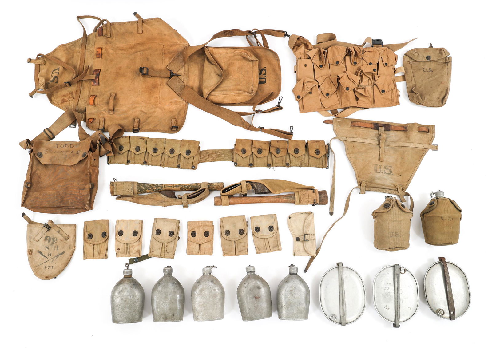WWI US ARMY M1910 HAVERSACK & FIELD GEAR LOT: WWI US ARMY M1910 HAVERSACK & FIELD GEAR LOT WWI US Army Field Gear Lot. Including .30 cal cartridge belt, gas mask carrying bag, T-Shovel cover, canteens, M1910 haversack, 1911 ammo clip pouches and