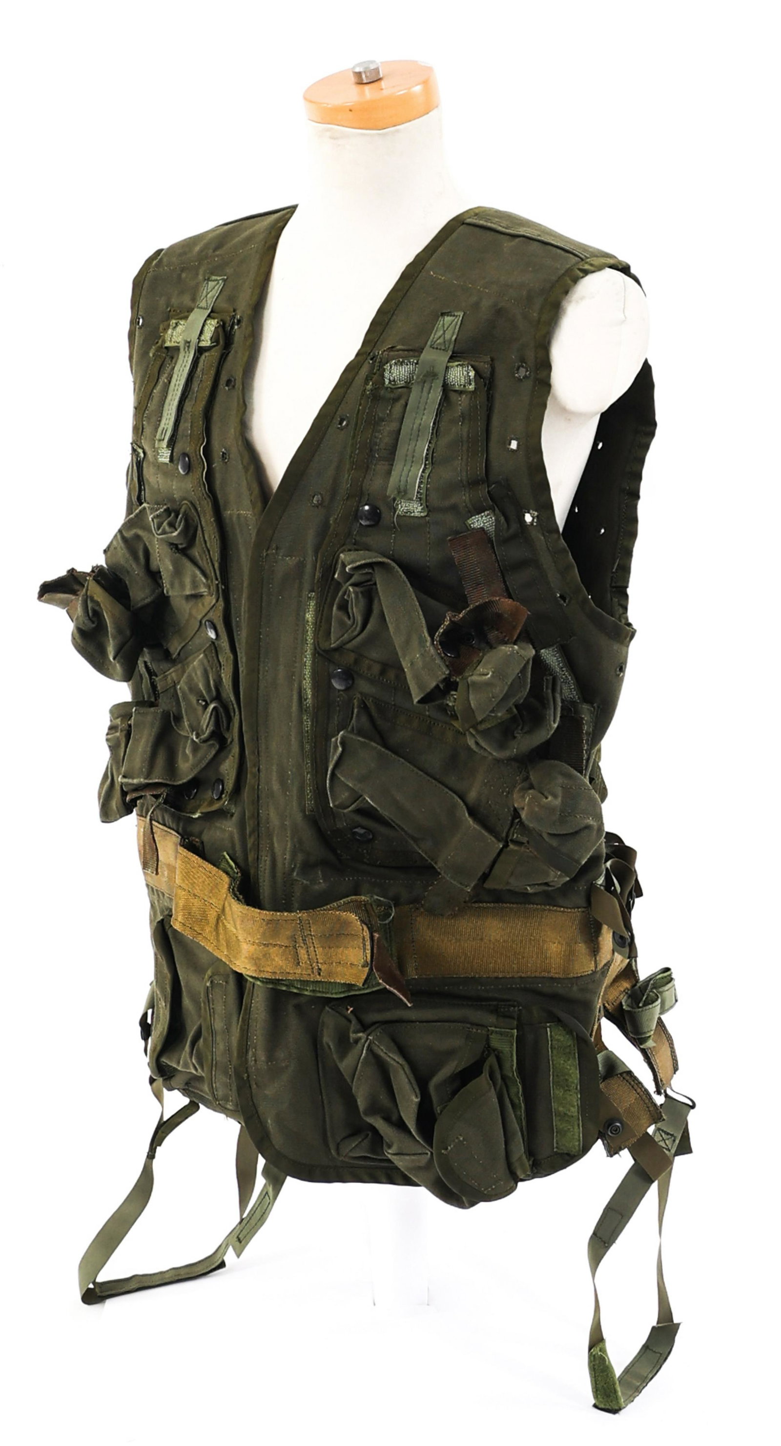 1980's US S.F. EXPERIMENTAL INFILTRATOR VEST: 1980's US S.F. EXPERIMENTAL INFILTRATOR VEST 1980's US Army Special Forces Experimental Infiltrator Vest Combat System. Olive green canvas construction with ammo pouches and IFAK bag without contents.