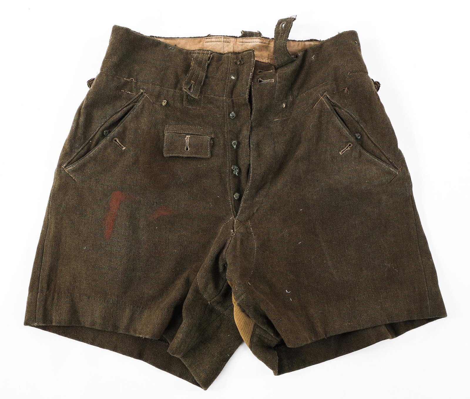 WWII GERMAN AFRIKA KORPS M40 POW TROPICAL SHORTS: WWII GERMAN AFRIKA KORPS M40 POW TROPICAL SHORTS WWII German Afrika Korps M40 POW Tropical Shorts. Dark olive wool construction. Ink stamps present on the waistband. Trace of POW red paint marking. Si