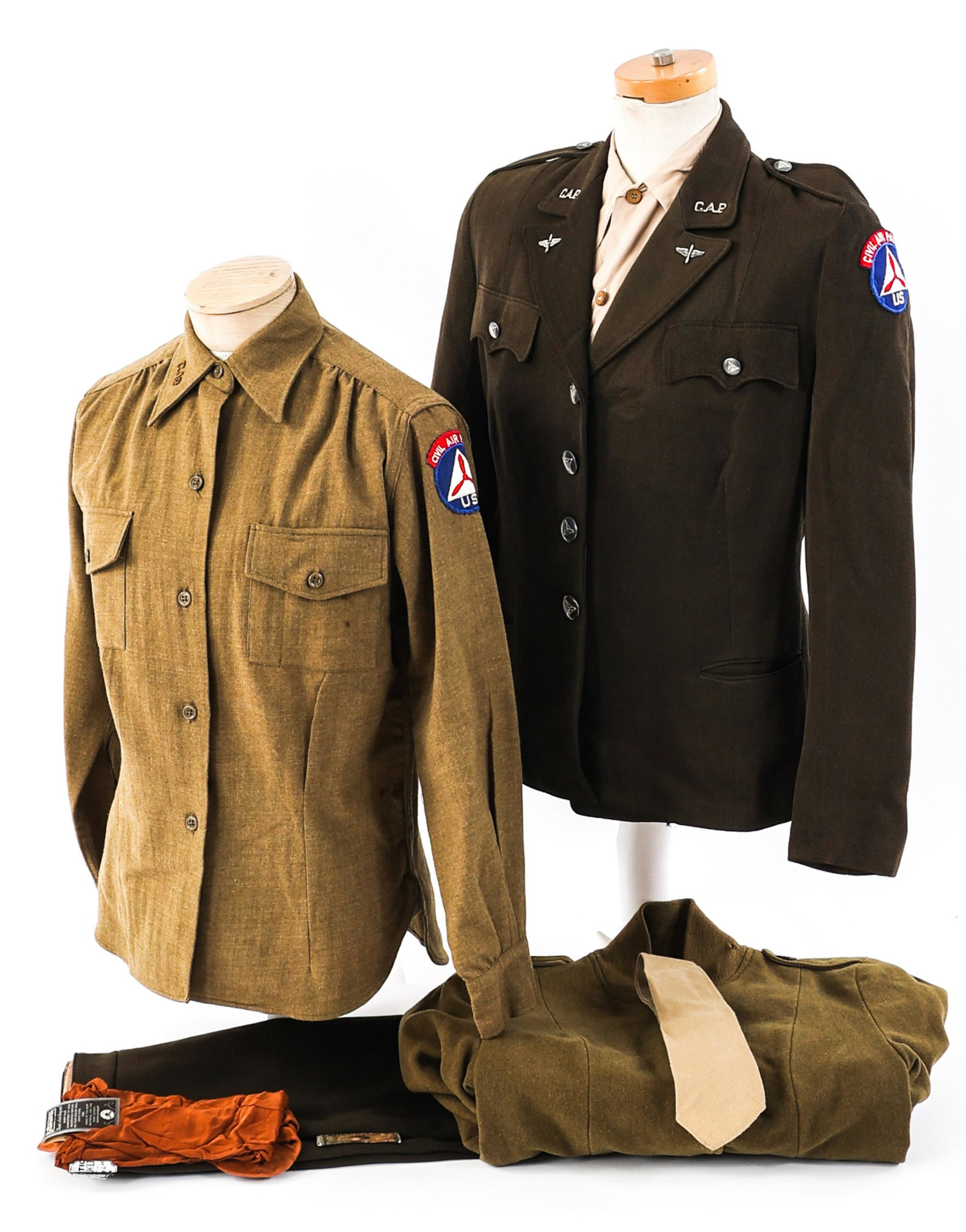WWII US CIVIL AIR PATROL WAC FEMALE UNIFORMS: WWII US CIVIL AIR PATROL WAC FEMALE UNIFORMS WWII US Civil Air Patrol WAC Uniforms. (1) CAP Service Dress Tunic. Army pattern, chocolate tunic with Civil Air Patrol Shoulder patch. Civil Air Patrol an