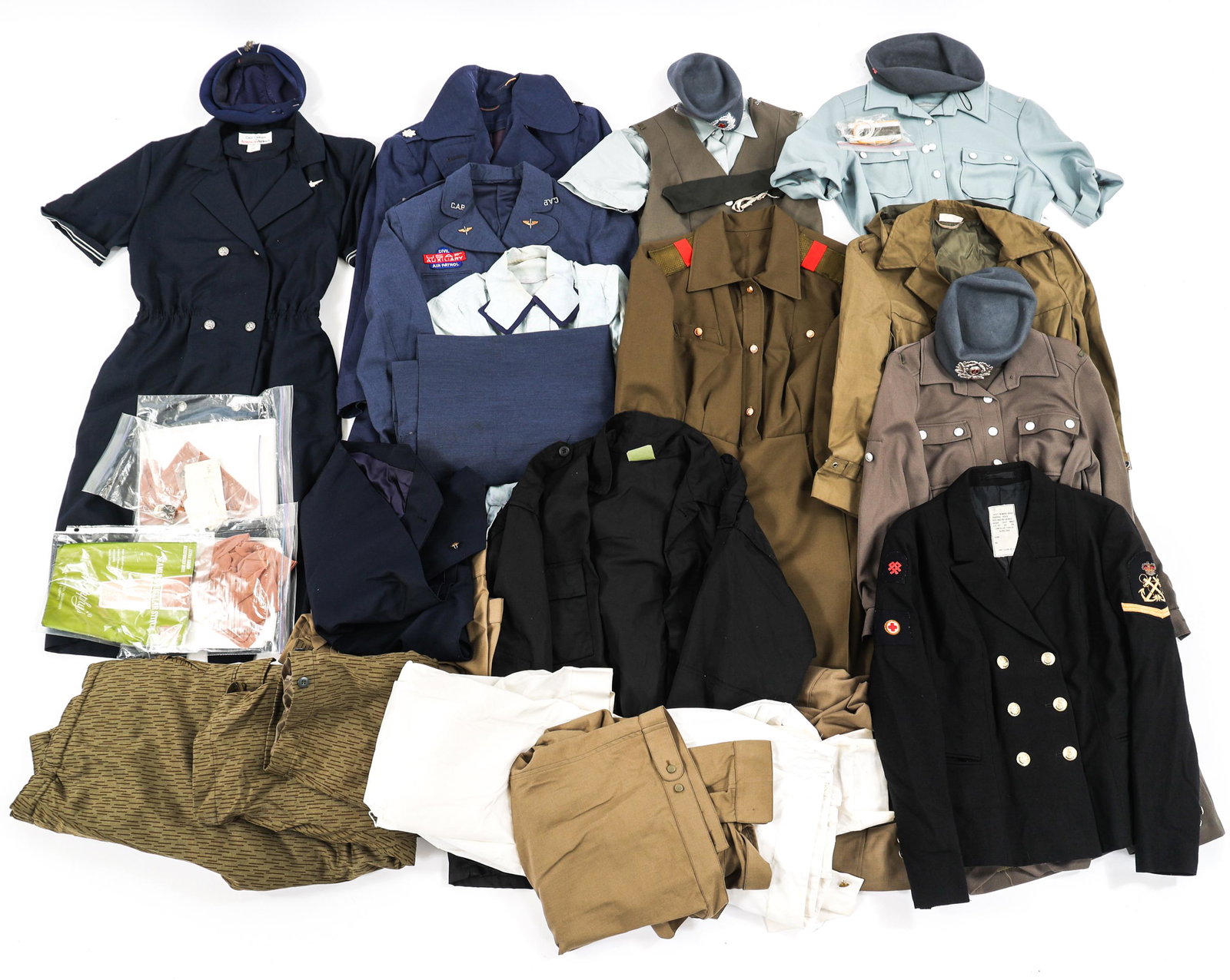 WWII - COLD WAR WORLD MILITARY & NURSE UNIFORM LOT: WWII - COLD WAR WORLD MILITARY & NURSE UNIFORM LOT Lot of WWII - Cold War World Military and Nurse Uniforms. Includes German, US, Canadian and Soviet uniform tunics, shirts, trousers, caps and more.