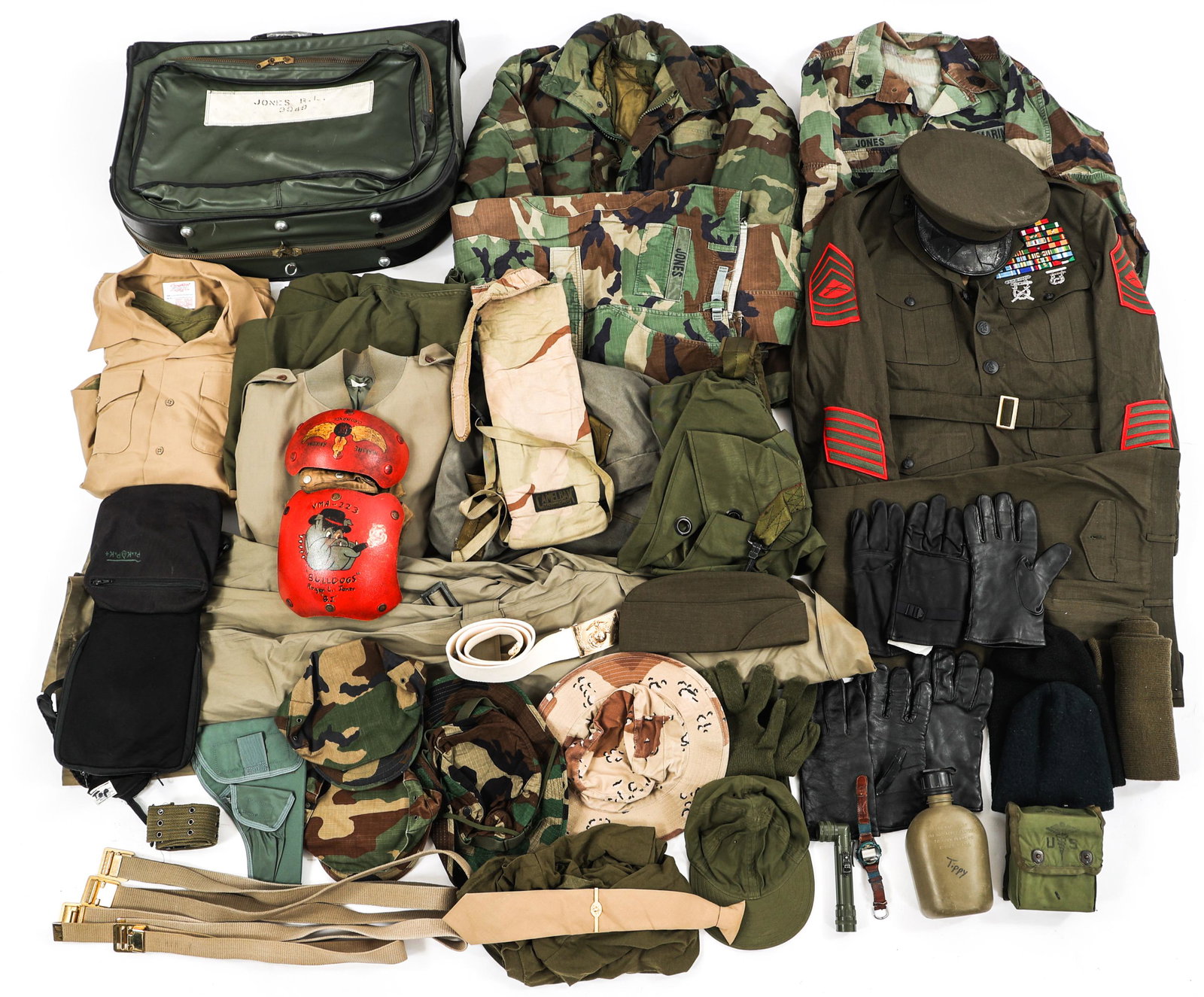 COLD WAR - CURRENT USMC UNIFORM NAMED GROUPING: COLD WAR - CURRENT USMC UNIFORM NAMED GROUPING Cold War - Modern Conflicts USMC Named Uniform. Named to Master Sergeant Roger L. Jones. Includes service alpha uniform with cap, tunic, and trousers, wi