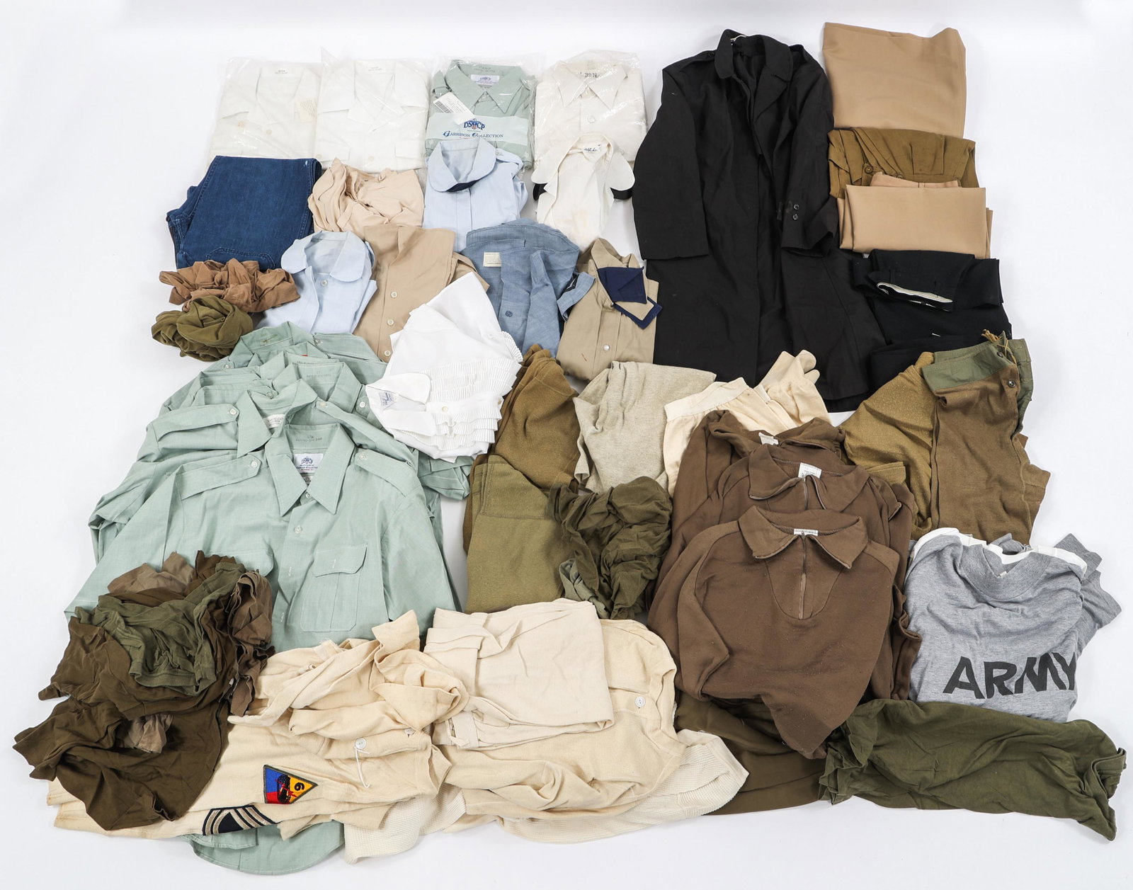COLD WAR - CURRENT US ARMY UNIFORM LOT: COLD WAR - CURRENT US ARMY UNIFORM LOT Lot of Cold War to Modern Conflicts US Army Uniforms. Including uniform shirts, PT shirts, sweaters, skirts, stockings and more. Size: Medium