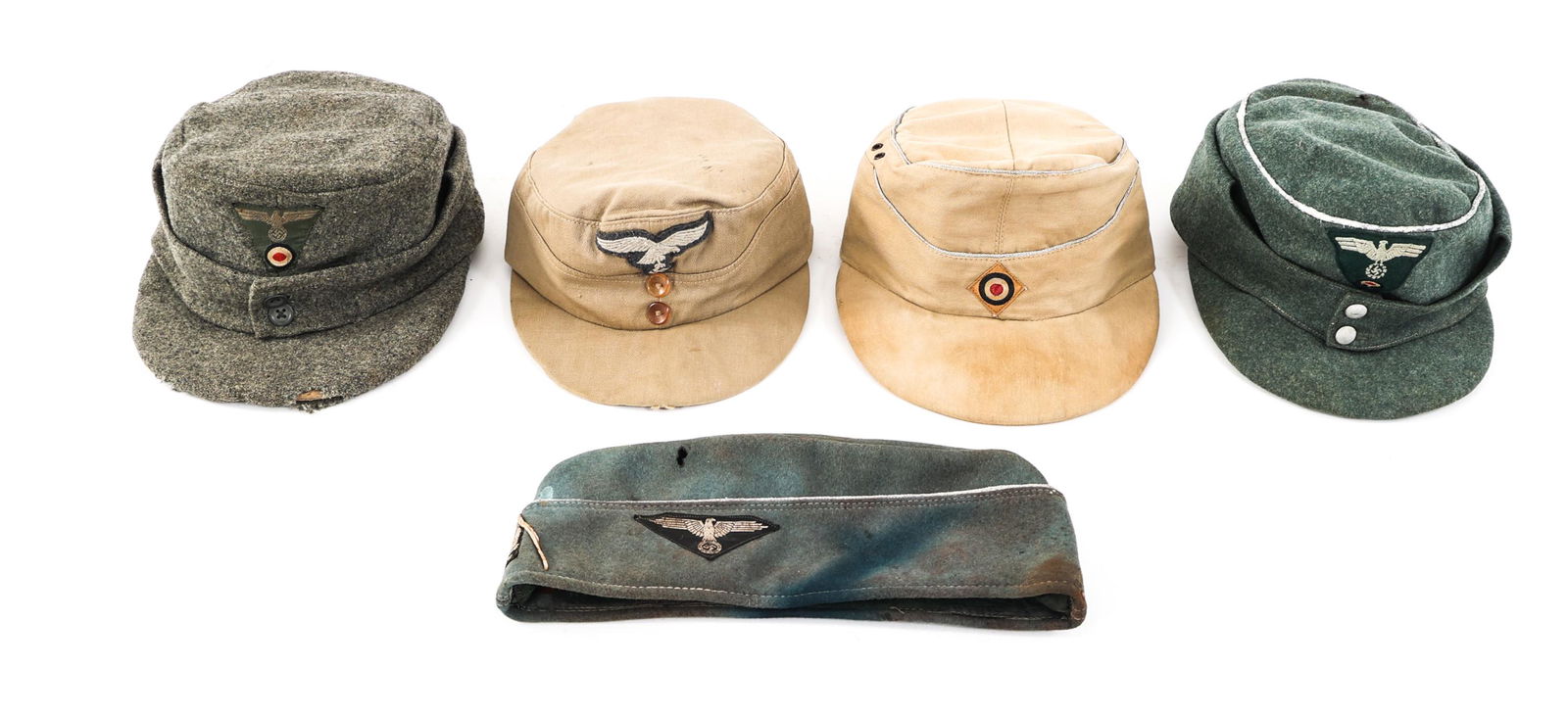 REENACTOR WWII GERMAN HEADGEAR: REENACTOR WWII GERMAN HEADGEAR Reenactor Contemporary Post-War Production WWII German Headgear. Including M43 field cap and garrison cap.