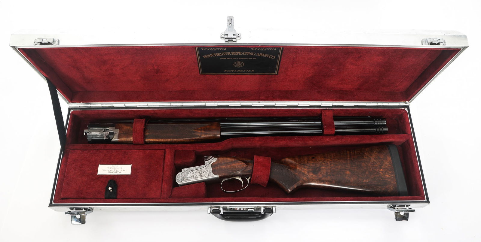 WINCHESTER MODEL SUPREME ELEGANCE 12 GA SHOTGUN: WINCHESTER MODEL SUPREME ELEGANCE 12 GA SHOTGUN Winchester Model Supreme Elegance 12 gauge over under shotgun. Made by FN Belgium. Blued finish. Double bead sight. Engraved coin finish receiver. Invec
