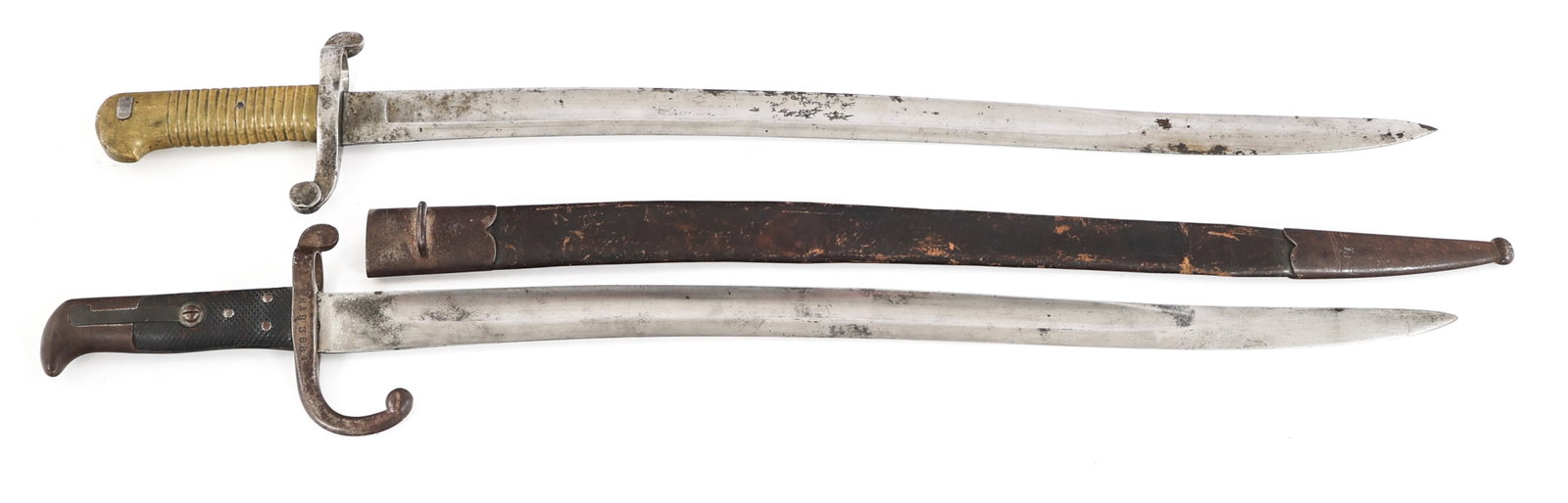 19th C. DANISH M1867 & GERMAN YATAGHAN BAYONET LOT: 19th C. DANISH M1867 & GERMAN YATAGHAN BAYONET LOT 19th C. Danish M1867 & German Yataghan Sword Bayonets. (1) Danish M1867 Bayonet. Single edged, bright, yataghan blade with fuller. Maker marked by EB