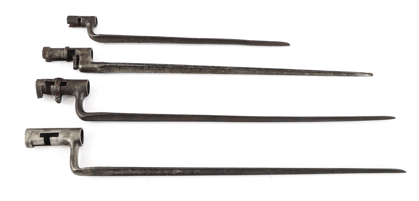 19th C. WORLD MILITARY SOCKET BAYONET LOT OF 4: 19th C. WORLD MILITARY SOCKET BAYONET LOT OF 4 Lot of Four 19th Century World Military Socket Bayonets. (1) Russian M1891 / 30. Straight, cruciform blade. Serial number and proof marks stamped on the 