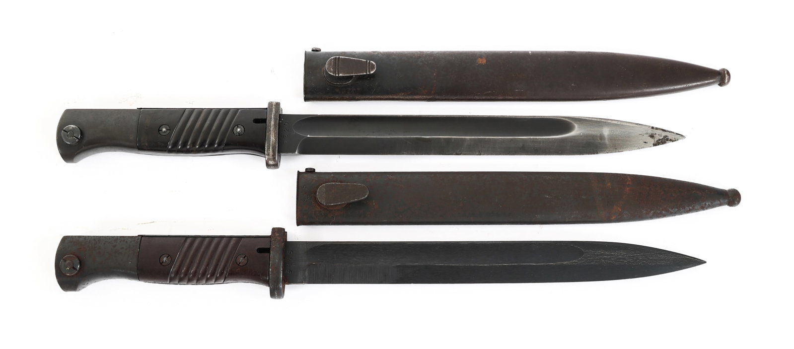 WWII GERMAN K98 BAYONETS & MATCHING SCABBARDS: WWII GERMAN K98 BAYONETS & MATCHING SCABBARDS Lot of 2 WWII K98 Combat Bayonets. (1) Matching Numbers WWII German K98 Combat Bayonet with Scabbard. Single edge, blued fullered blade. Maker marked by C
