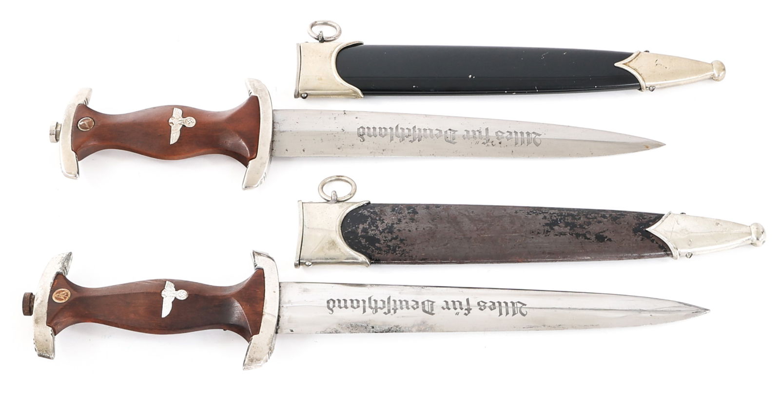 WWII GERMAN NSKK PARTS DAGGERS LOT OF 2: WWII GERMAN NSKK PARTS DAGGERS LOT OF 2 WWII German NSKK Parts Daggers. (2) Double edged, bright blade with acid etched motto "Alles Fur Deutschland" in light grey background. RZM code by M7 / 72 / 38