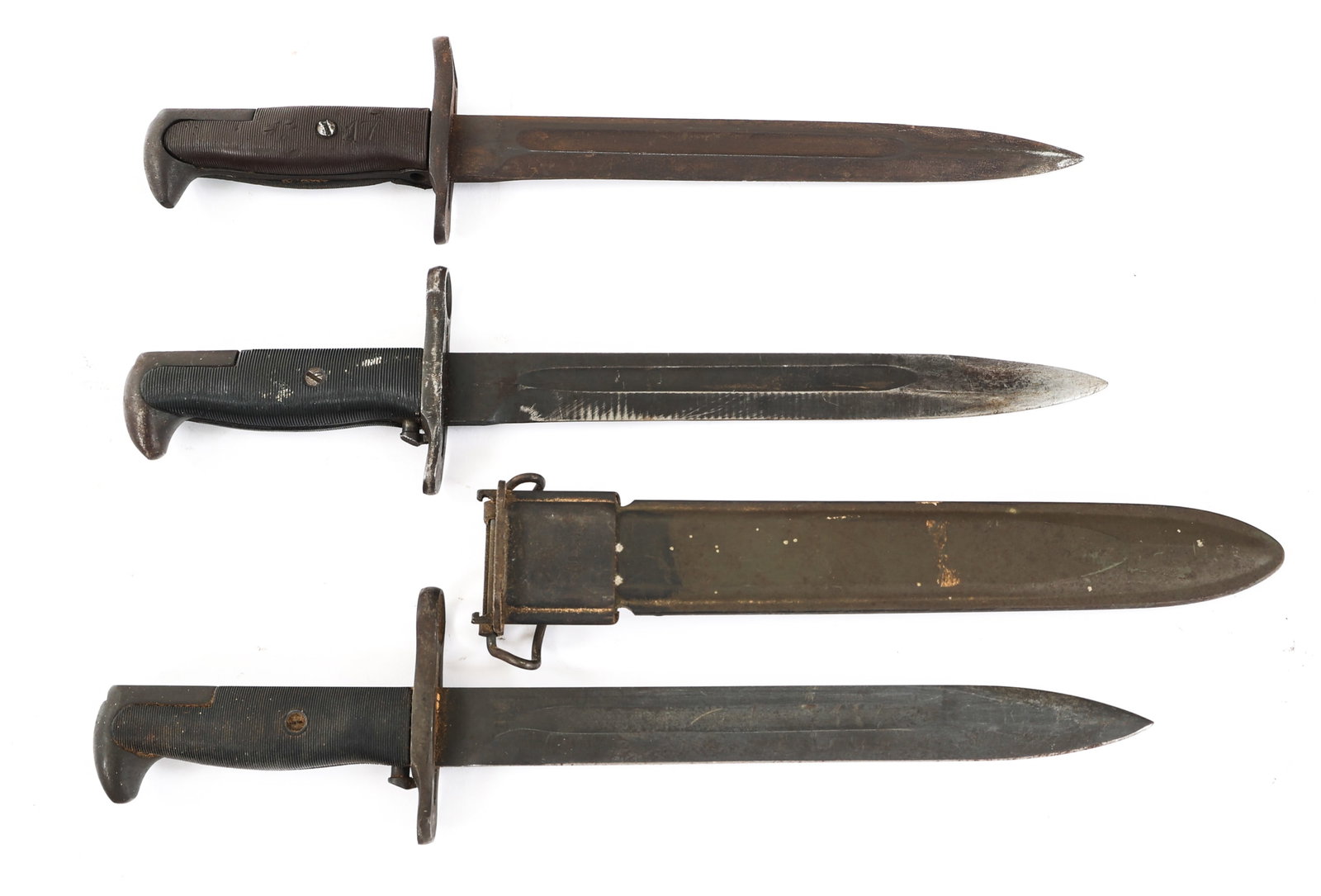 WWII US ARMY M1 BAYONET LOT OF 3: WWII US ARMY M1 BAYONET LOT OF 3 Lot of 3 WWII US Army M1 Bayonets. (1) M1 Bayonet. Singled edged, blued blade with fuller. Maker mark and "US" with Ordnance Dept. flaming bomb on the ricasso. Steel h