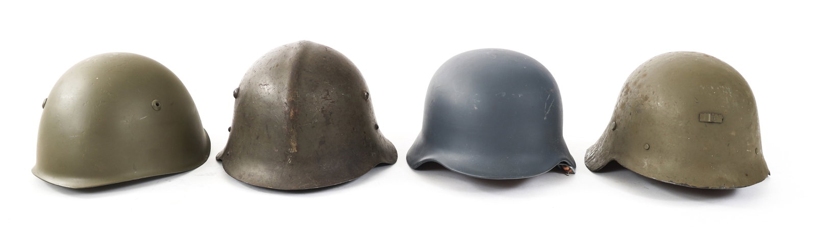 WWII - COLD WAR WORLD MILITARY HELMET LOT OF 4: WWII - COLD WAR WORLD MILITARY HELMET LOT OF 4 Lot of 4 WWII - Cold War World Military Helmets. (1) Spanish M26. (1) West German M35/53. No vent holes. (1) Italian M33. (1) Bulgarian M36.