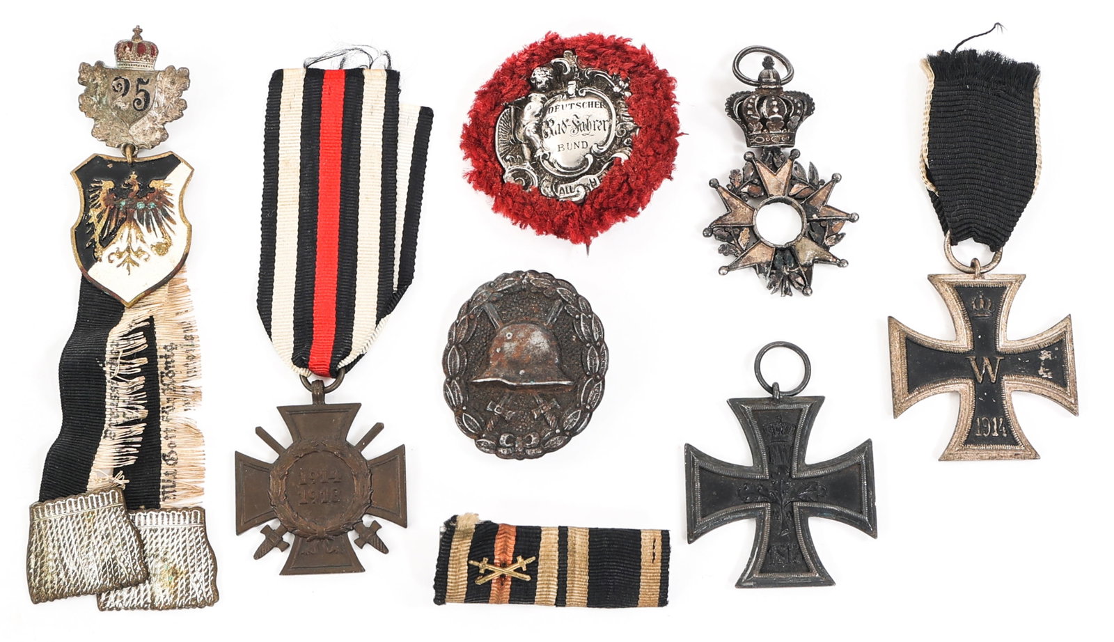 WWI IMPERIAL GERMAN MEDAL & RIBBON LOT: WWI IMPERIAL GERMAN MEDAL & RIBBON LOT Lot of WWI German Medal and Ribbon Lot. Includes Combatants Cross of Honor with ribbon, German Wound Badge, Iron Cross, Iron Cross with ribbon, Prussian Veteran'