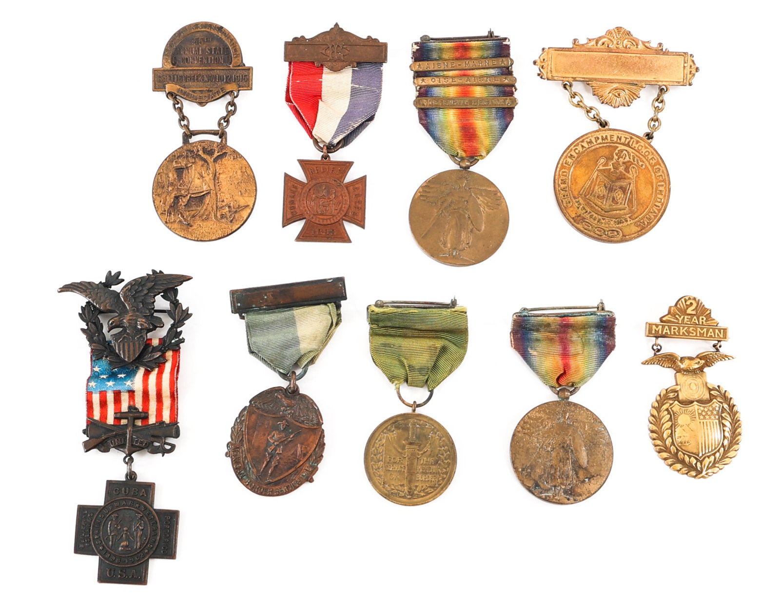 SPAN-AM WAR - WWI US ARMY & FRATERNAL MEDAL LOT: SPAN-AM WAR - WWI US ARMY & FRATERNAL MEDAL LOT Spanish American War - WWI US Army & Fraternal Organization Medals. Includes two WWI victory medals, Spanish American War Veterans Medal, Tiffany & Co. 