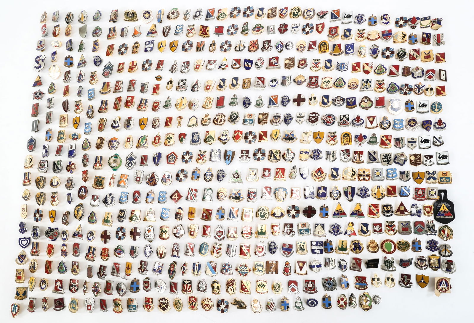 WWII - COLD WAR US ARMED FORCES DUI PIN LOT: WWII - COLD WAR US ARMED FORCES DUI PIN LOT Approximately 10 lbs of WWII - Cold War Armed Forces DUI Pins.