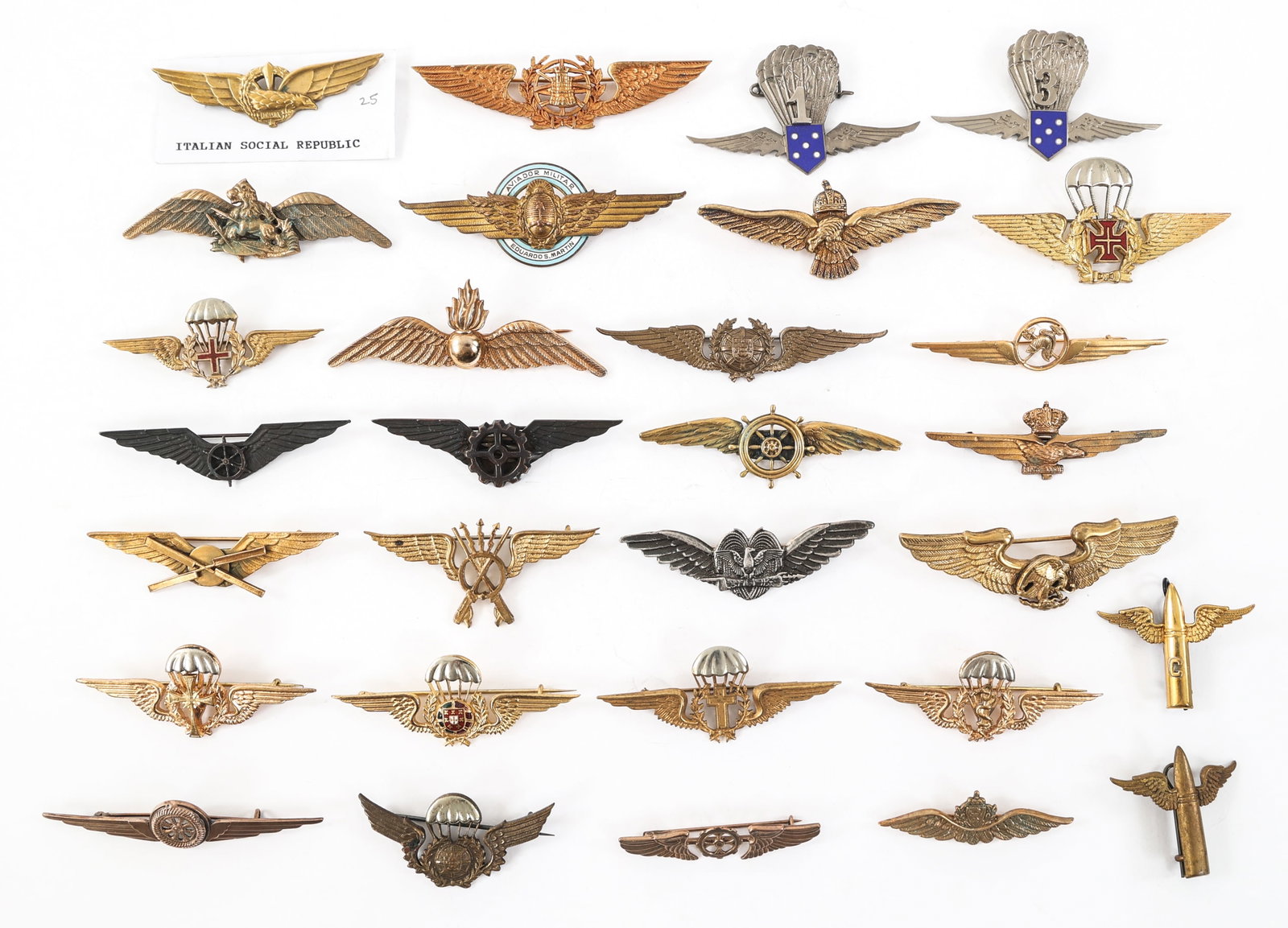 WWII - COLD WAR WORLD MILITARY PILOT & JUMP WINGS: WWII - COLD WAR WORLD MILITARY PILOT & JUMP WINGS Lot of Approximately 30 WWII - Cold War World Military Pilot & Jump Wings. Includes Portuguese, Argentinian, Mexican, Italian Socialist Republic, and 
