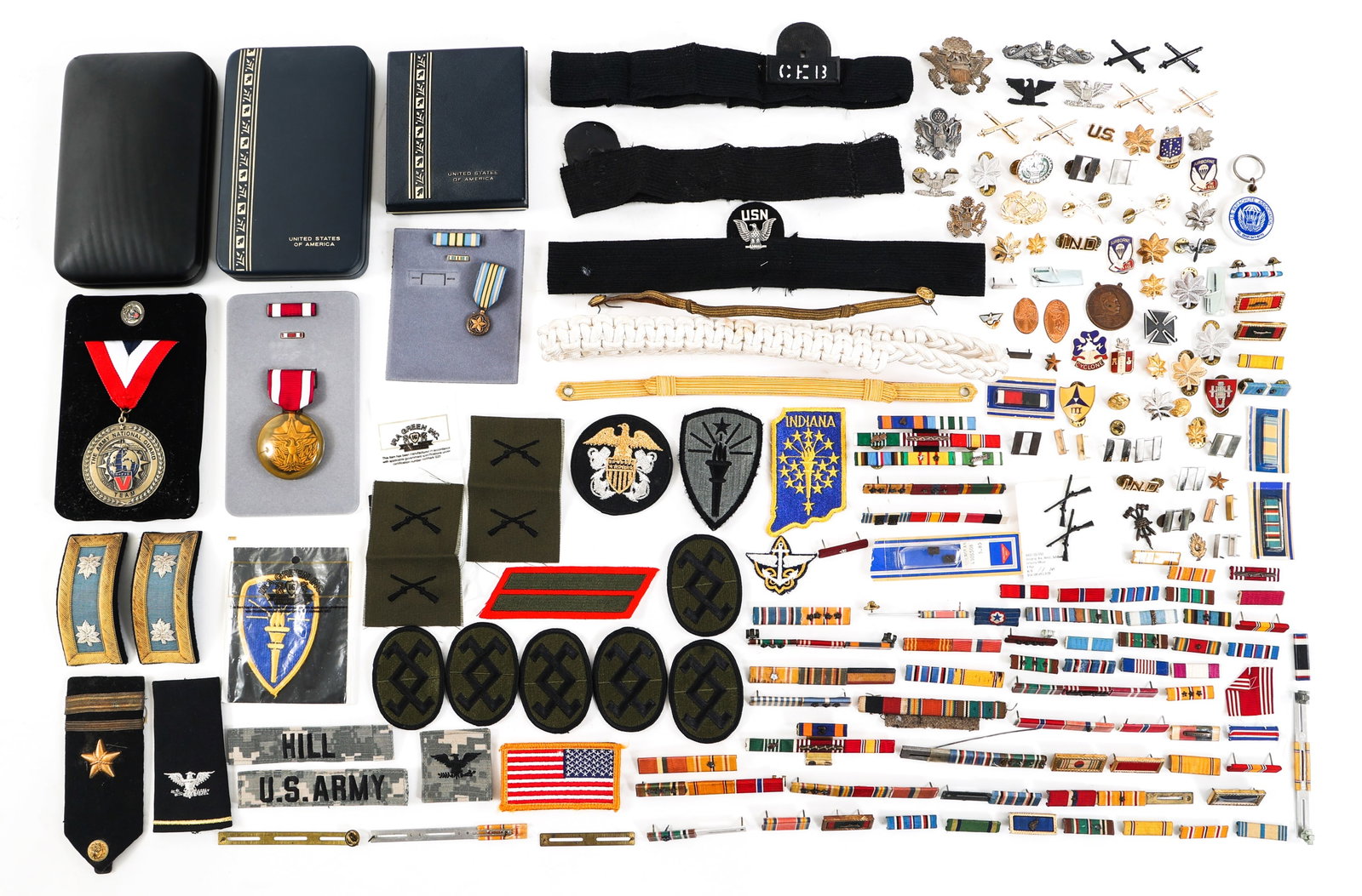 MODERN US ARMED FORCES PATCHES & INSIGNIA: MODERN US ARMED FORCES PATCHES & INSIGNIA Lot of Approximately 4 lbs of Modern US Armed Forces Uniform Patches, Insignia, Medals and More. Including Ribbon bars, ACU camo nametapes, The National Guard