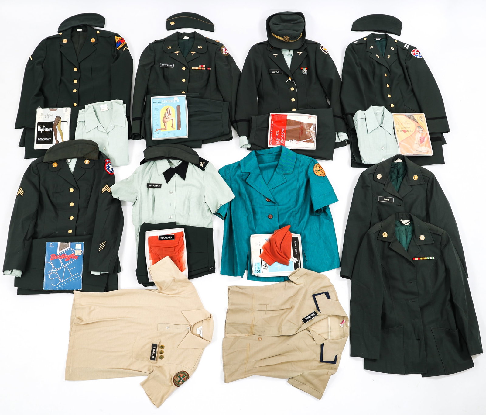 COLD WAR US ARMY WOMENS SERVICE UNIFORM LOT: COLD WAR US ARMY WOMENS SERVICE UNIFORM LOT Lot of Assorted Cold War US Army Women's Service Uniforms. Includes Army green tunics, coats, skirts, and slacks. Summer service shirts, various work shirts