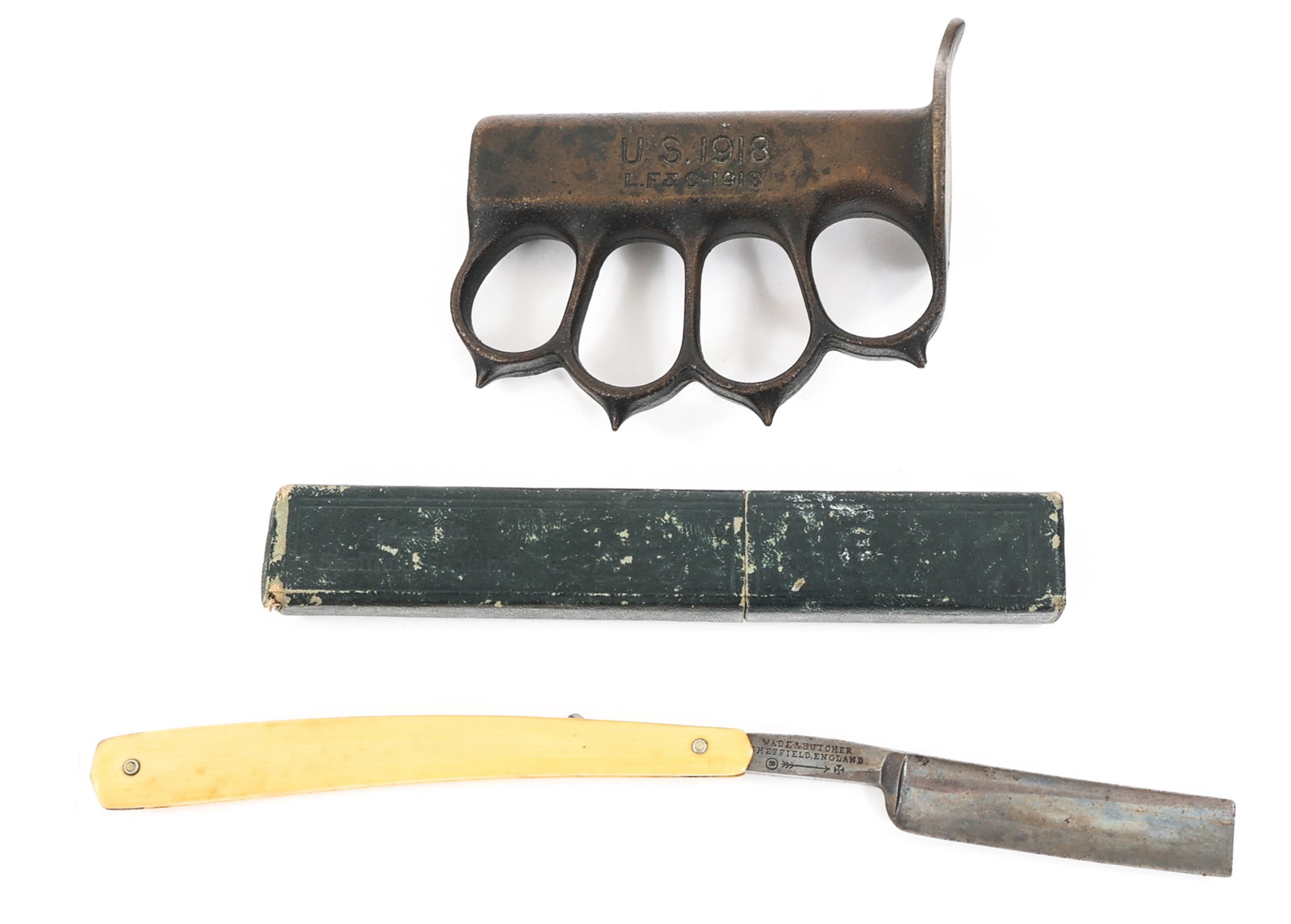 WWI US ARMY M1918 KNUCKLE GUARD & STRAIGHT RAZOR: WWI US ARMY M1918 KNUCKLE GUARD & STRAIGHT RAZOR WWI US Army M1918 Knuckle Guard & Straight Razor. (1) Brass one piece knuckle guard and grip from M1918 Trench Knife. "US 1918 L.F. & C - 1918" stamped