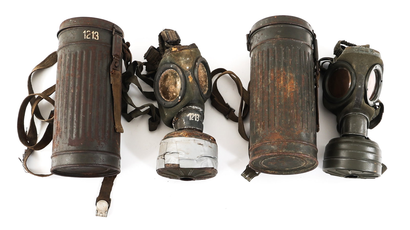 WWII GERMAN WEHRMACHT M30 GAS MASK W/ CONTAINER: WWII GERMAN WEHRMACHT M30 GAS MASK W/ CONTAINER Lot of 2 WWII German Wehrmacht M30 Gas Masks with Containers. Filter canisters marked "Fe".