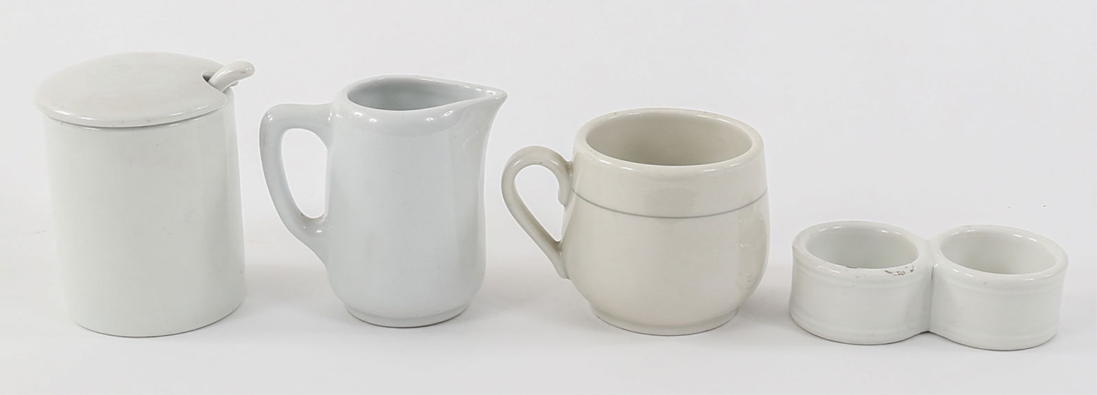 WWII GERMAN WEHRMACHT & RED CROSS TEA SET: WWII GERMAN WEHRMACHT & RED CROSS TEA SET WWII German Wehrmacht & Red Cross Porcelain Tea / Coffee Set. Includes Red Cross mug. Wehrmacht salt & pepper holder, creamer cup, and sugar bowl with lid & s