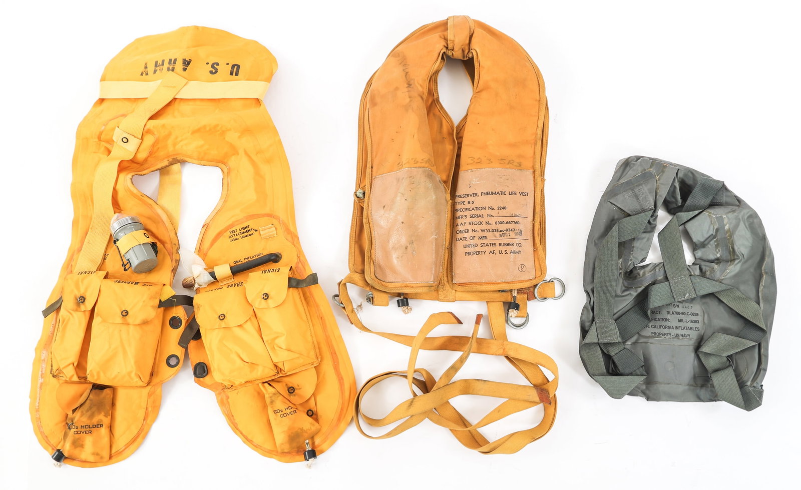 WWII - CURRENT US MILITARY LIFE VEST LOT OF 3: WWII - CURRENT US MILITARY LIFE VEST LOT OF 3 WWII - Current US Military Life Vests. (1) WWII USAAF Type B-5. Maker marked by United States Rubber Co. and dated August 1st, 1945. (1) Vietnam War US Ar