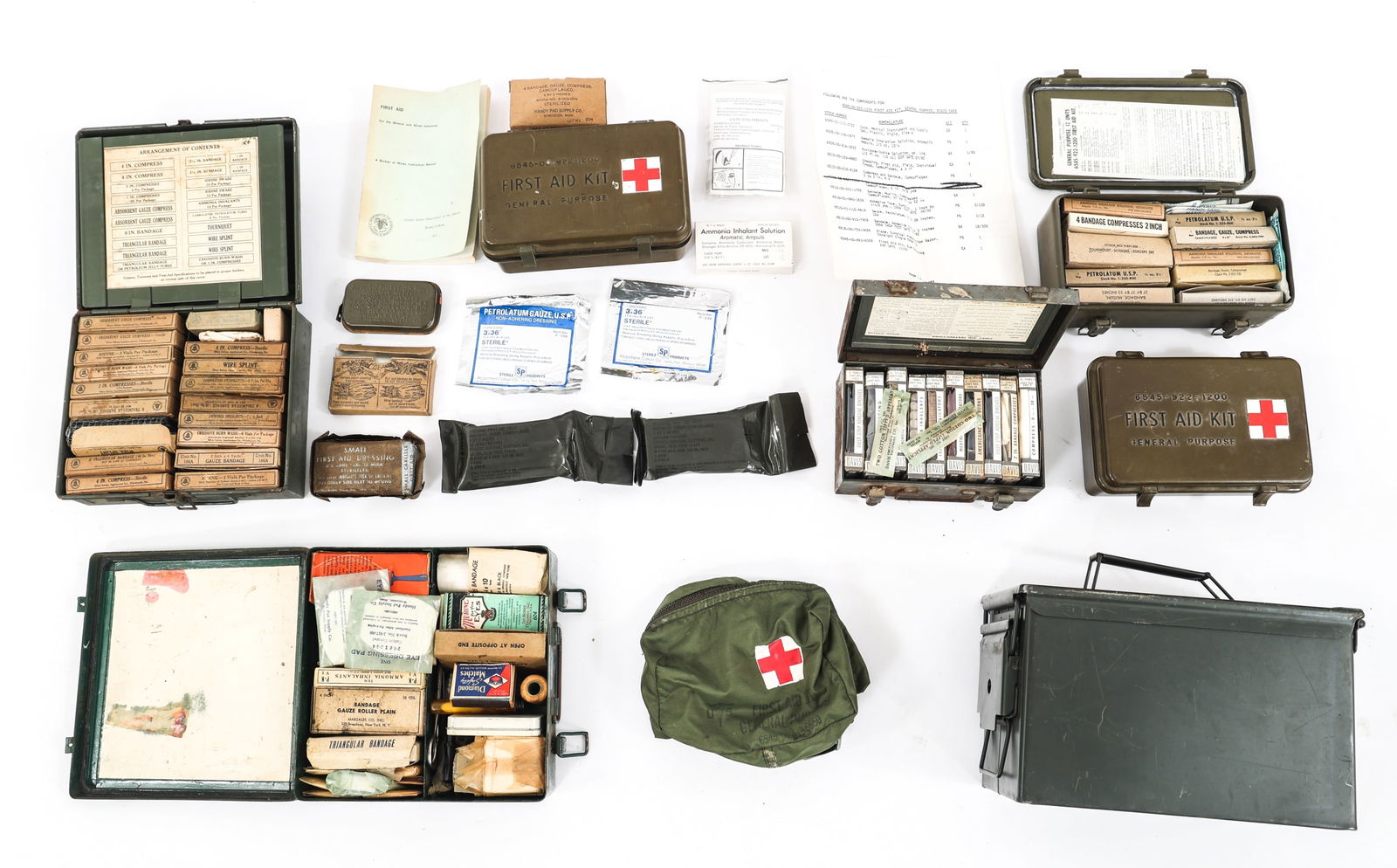 WWII - COLD WAR US ARMY FIRST AID KITS & SUPPLIES: WWII - COLD WAR US ARMY FIRST AID KITS & SUPPLIES WWII - Cold War US Army First Aid Kits and Supplies. Includes First aid boxes, bandages, petroleum gauze, ammonia inhalant, eye dressings, iodine appl