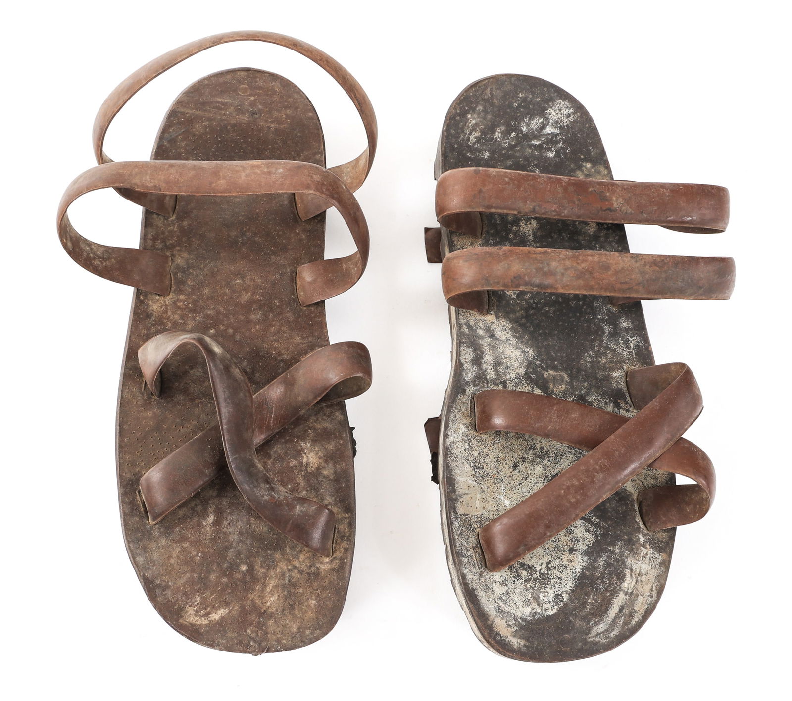 VIETNAM WAR NVA HO CHI MINH SANDALS: VIETNAM WAR NVA HO CHI MINH SANDALS Pair of Vietnam War People's Army of Vietnam Ho Chi Minh Sandals. Rubber sole and rubber strap construction. Size: 9 1/2