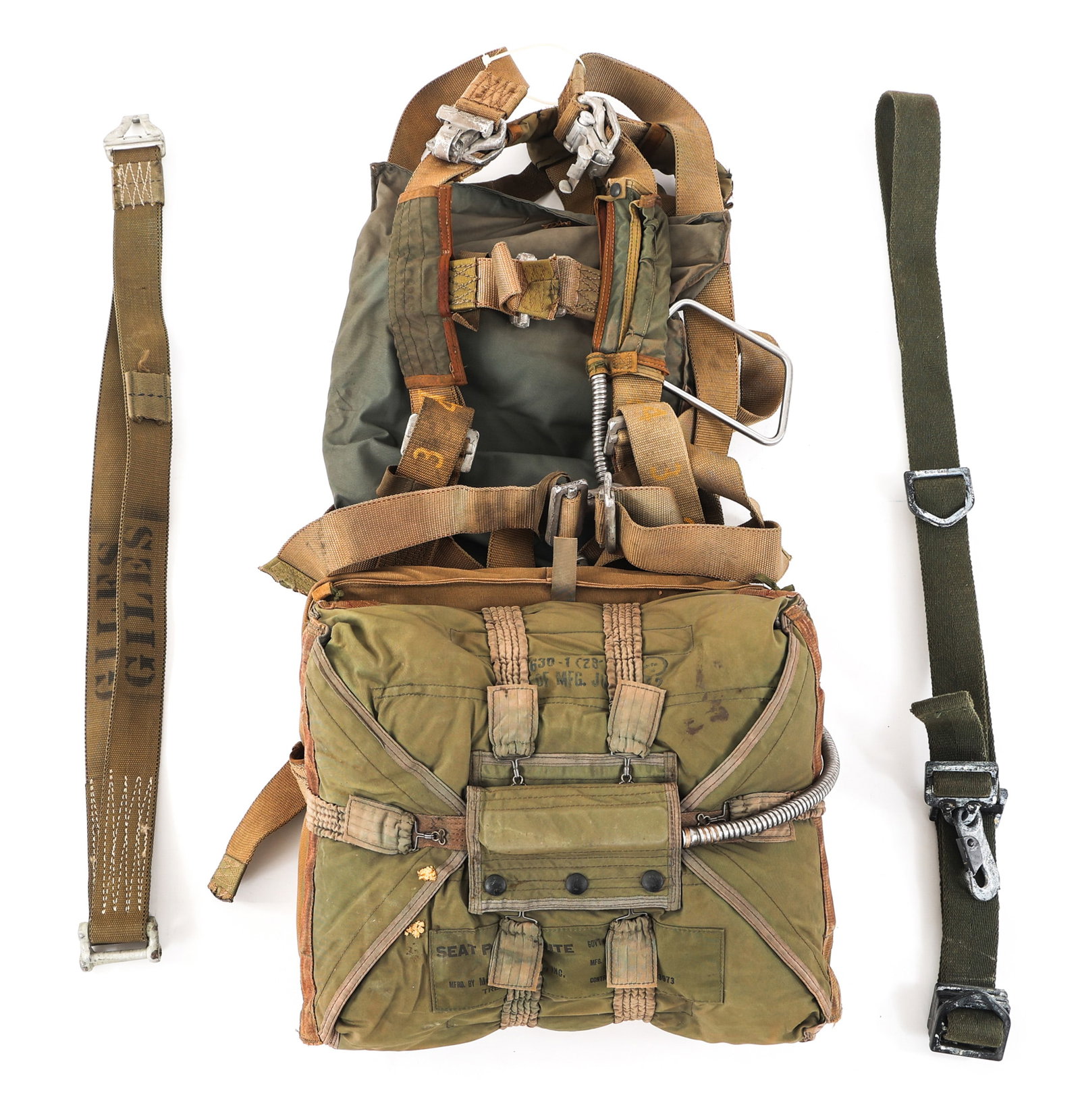 COLD WAR US AIR FORCE PILOTS SEAT TYPE PARACHUTE: COLD WAR US AIR FORCE PILOTS SEAT TYPE PARACHUTE Cold War US Air Force Seat Type Parachute and Harness. Maker marked by McPhillips & Co. Inc. and dated 1956. Total approximate weight: 24 lbs.