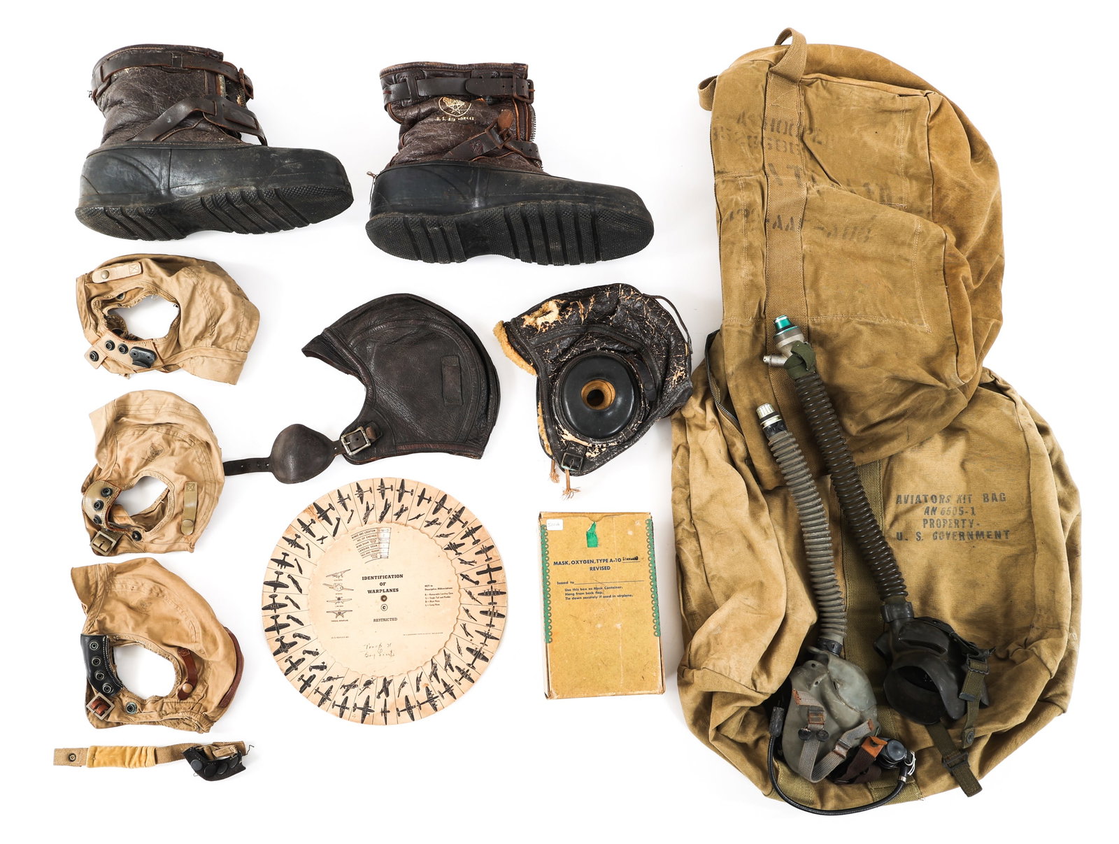 WWII USAAF & USN AIRCRAFT ID WHEEL & FLIGHT GEAR: WWII USAAF & USN AIRCRAFT ID WHEEL & FLIGHT GEAR WWII USAAF & US Navy Aircraft Identification Wheel & Flight Gear. (1) Double sided aircraft identification pinwheel chart. Multi-piece cardboard constr