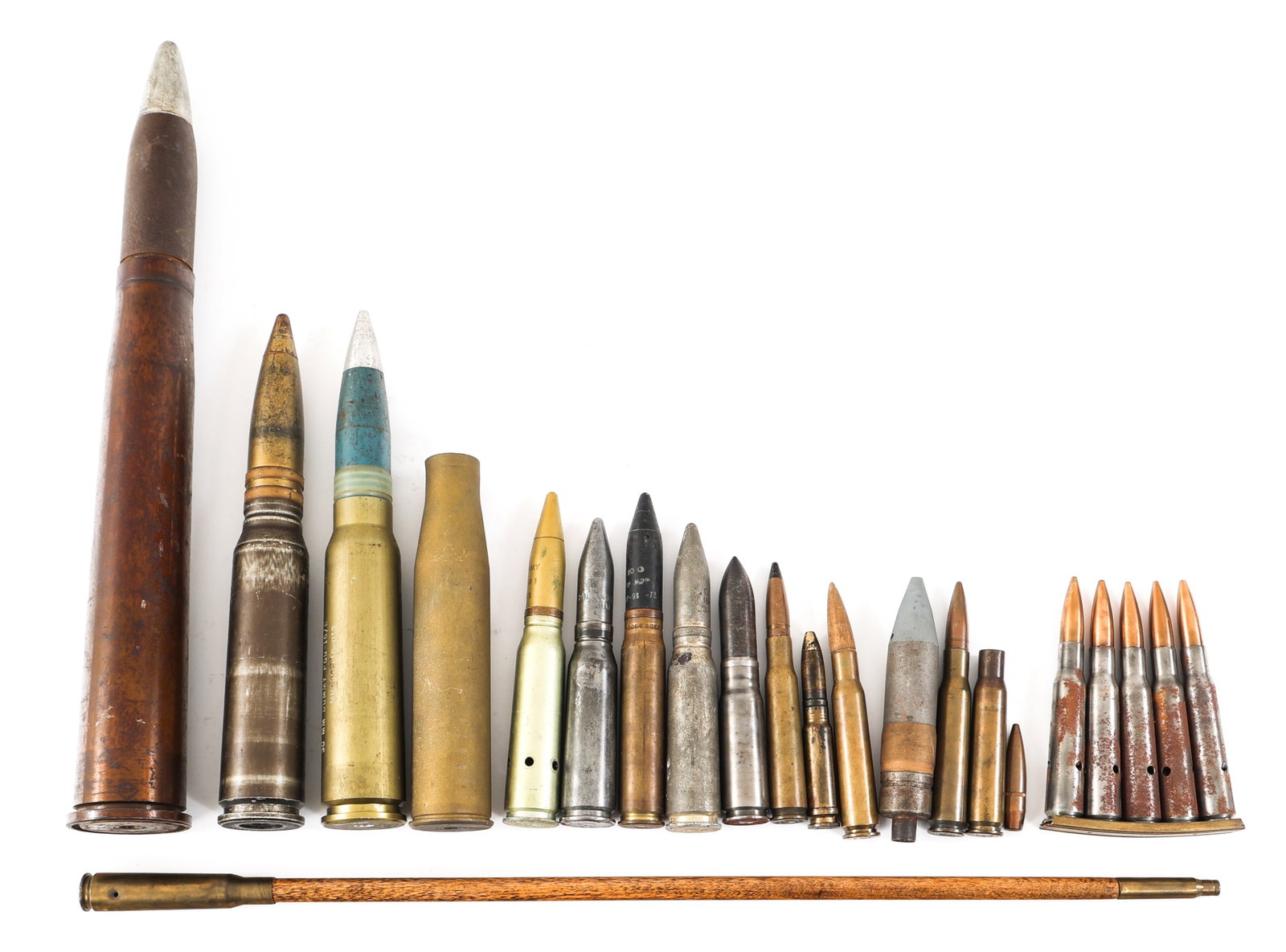 20TH C. MILITARY TRENCH ART & PRACTICE AMMUNITION: 20TH C. MILITARY TRENCH ART & PRACTICE AMMUNITION Lot of WWII - Cold War World Military Trench Art & Practice Ammunition. Includes pointer stick with wood shaft and shell casing handle & tip. Practice