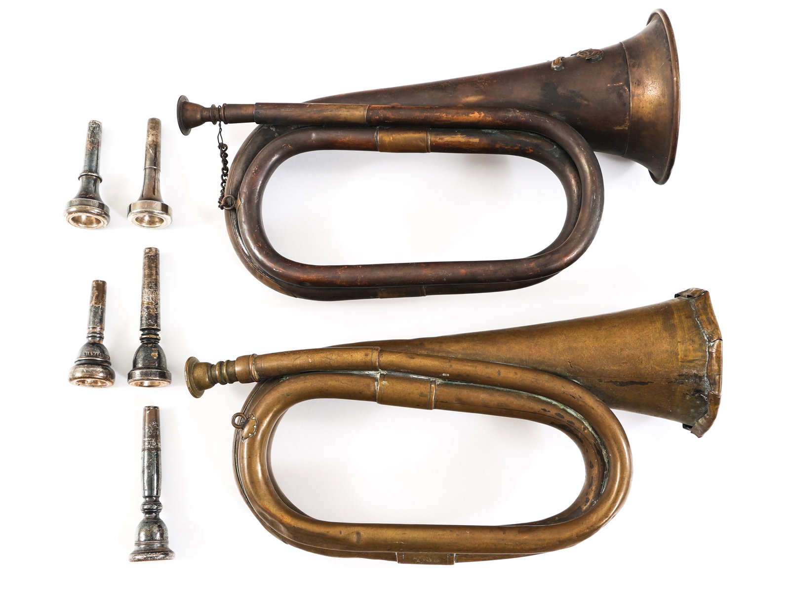 WWI - COLD WAR US ARMY & PAKISTANI MADE BUGLE LOT: WWI - COLD WAR US ARMY & PAKISTANI MADE BUGLE LOT Lot of 2 WWI - Cold War US Army & Pakistani Made Bugles. (1) US Army bugle. Brass construction. 7th Cavalry Regiment, Company A insignia. Brass mouth 